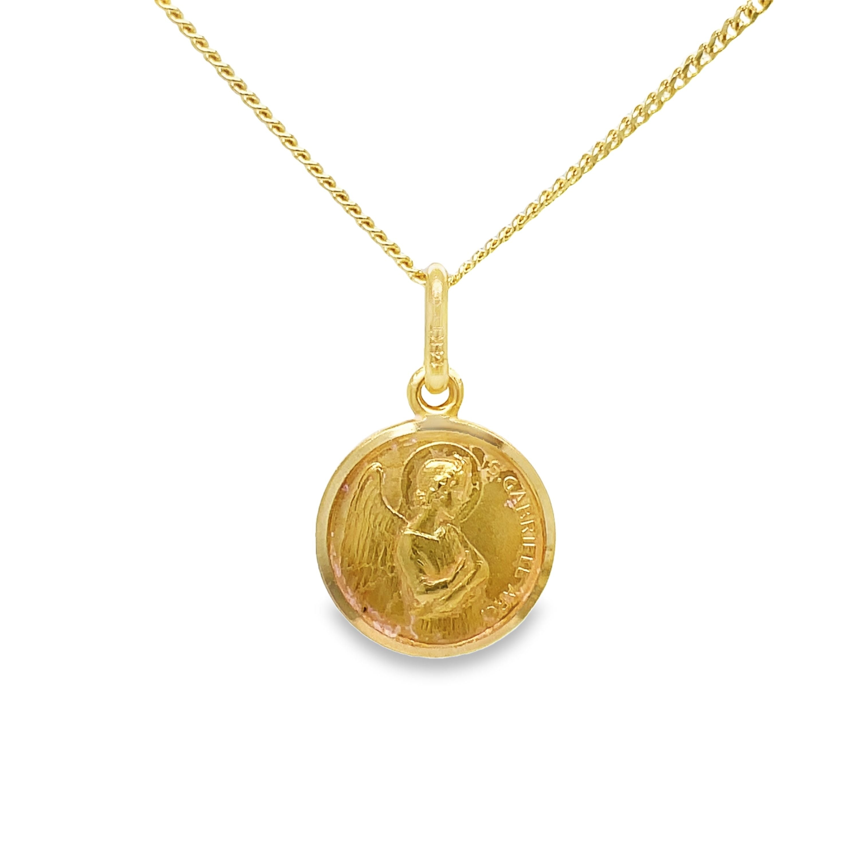 Expertly crafted from 14k Italian yellow gold, this pendant necklace features a saint gabriel medallion, known for its symbol of strength and protection. With a secure bail, the pendant measures 3/4" in length (including bail). Elevate your style and embrace the spiritual connection with this beautiful piece.