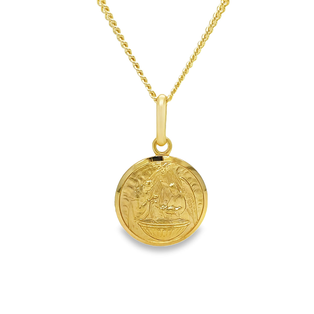 Expertly crafted from 14k Italian yellow gold, this pendant necklace features a communion medallion, known for its symbol of strength and protection. With a secure bail, the pendant measures 3/4" in length (including bail). Elevate your style and embrace the spiritual connection with this beautiful piece