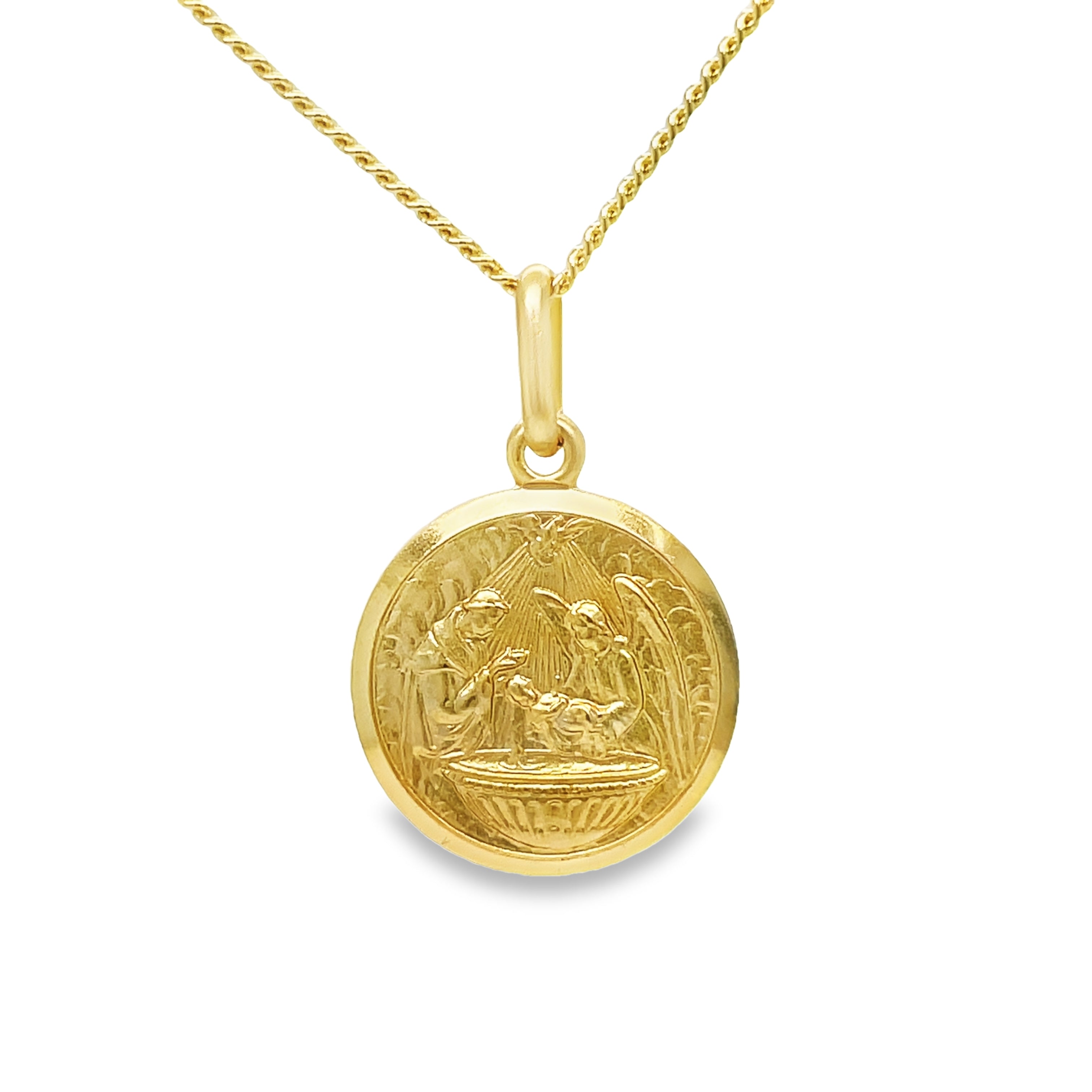 Expertly crafted from 14k Italian yellow gold, this pendant necklace features a communion medallion, known for its symbol of strength and protection. With a secure bail, the pendant measures 3/4" in length (including bail). Elevate your style and embrace the spiritual connection with this beautiful piece