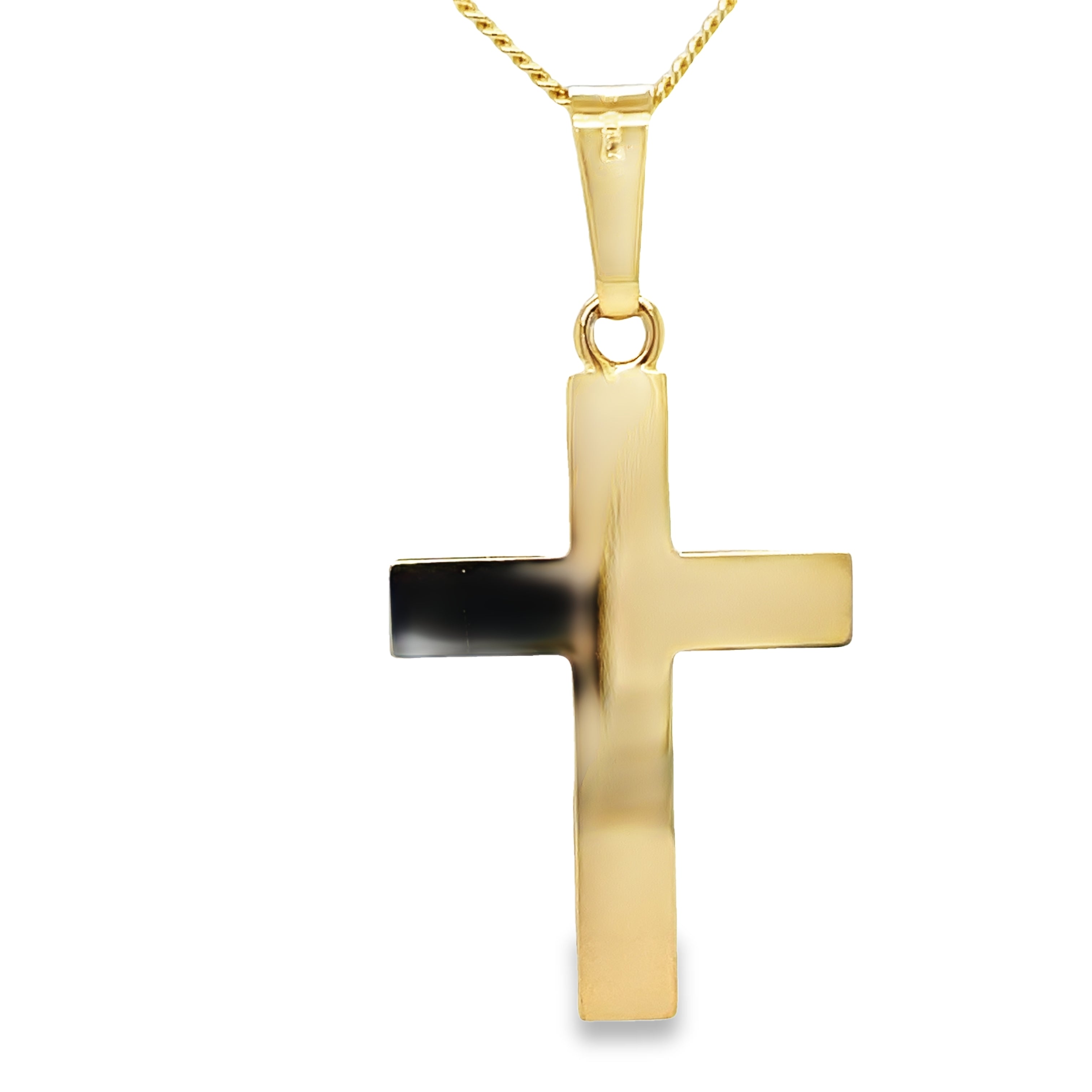 Crafted with expertise in Italy, this 14kt yellow gold cross showcases timeless elegance. The 14 karat yellow gold shines radiantly, while the optional ($599) 14 karat yellow gold chain 1.5" long complements the intricate design. At one inch long, this cross is the perfect addition to any jewelry collection.