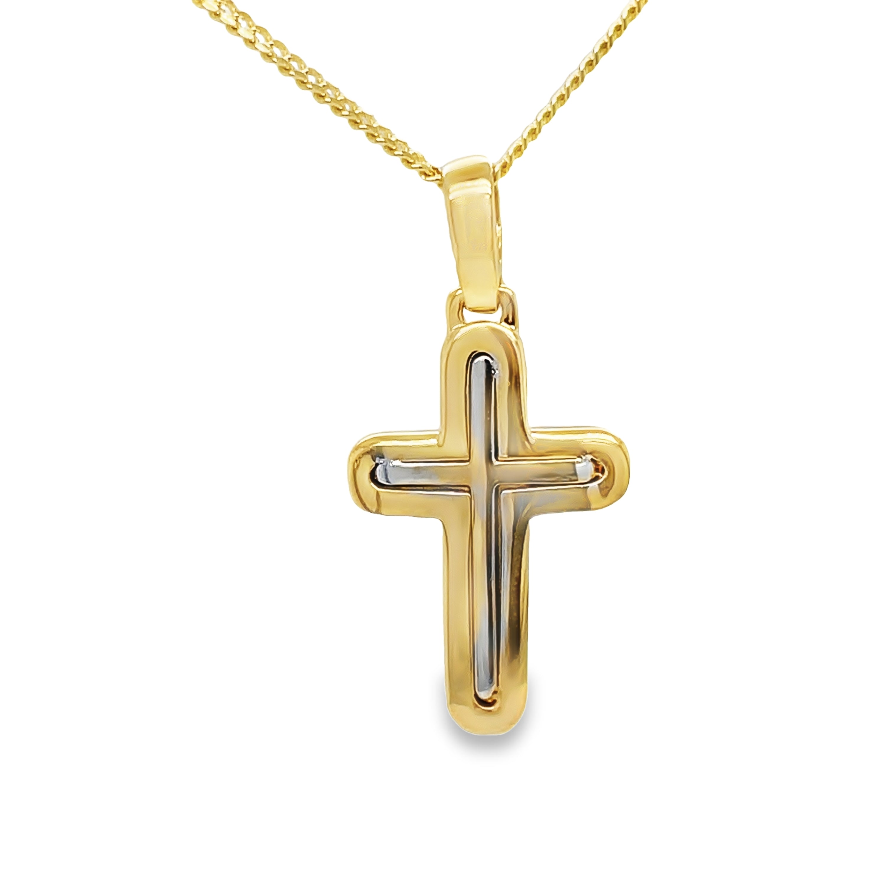 Crafted with expertise in Italy, this 14kt two-tone gold cross showcases timeless elegance. The 14 karat yellow gold shines radiantly, while the optional 14 karat yellow gold chain complements the intricate design. At one inch long, this cross is the perfect addition to any jewelry collection.