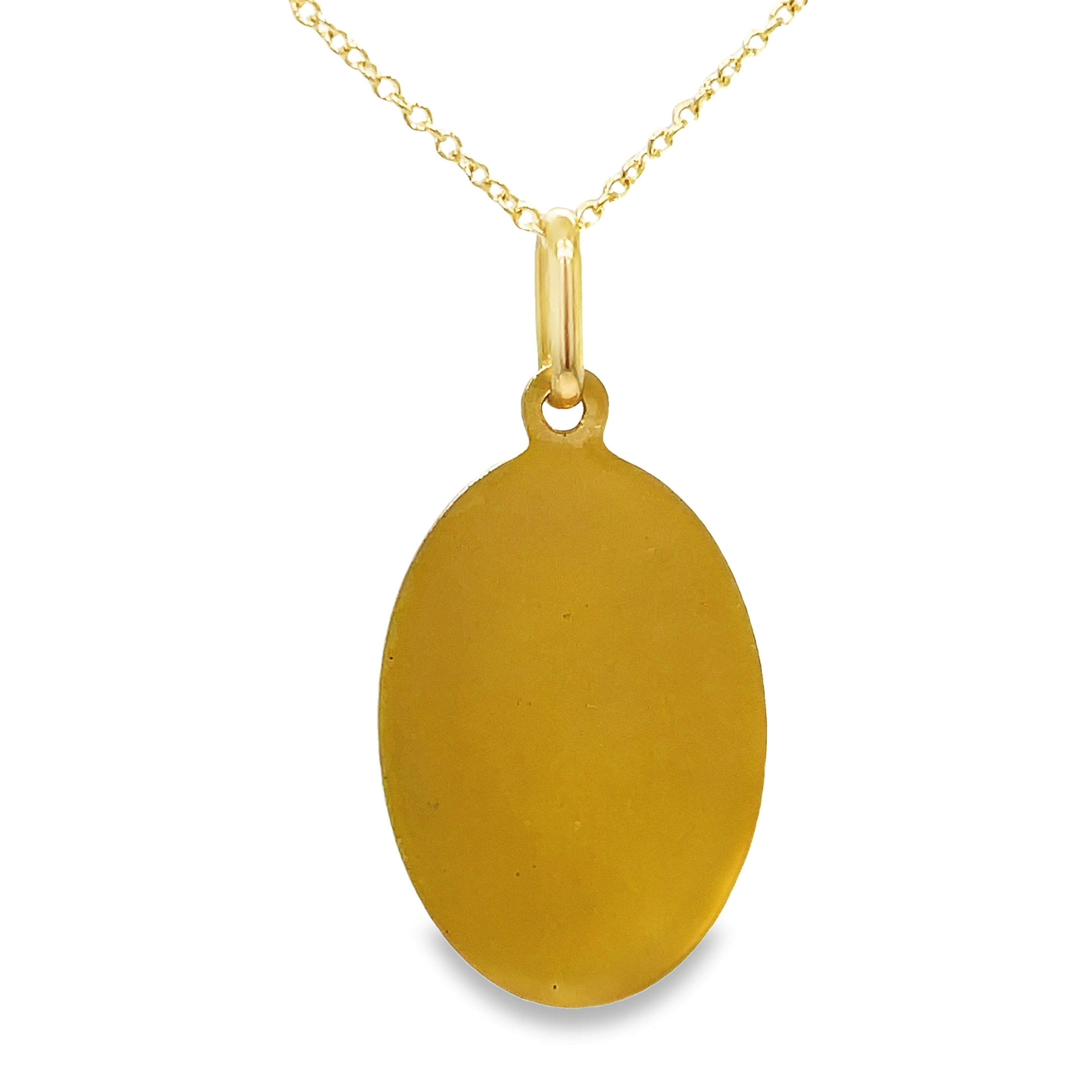 Crafted with 18k Italian yellow gold, this pendant necklace features a stunning Madonna Virgin medal with a matte finish. Measuring 27.00 x 15.00 mm, this elegant piece is a beautiful addition to any jewelry collection. Chain sold separately for $350.00 (18K). Enhance your style with this exquisite necklace.