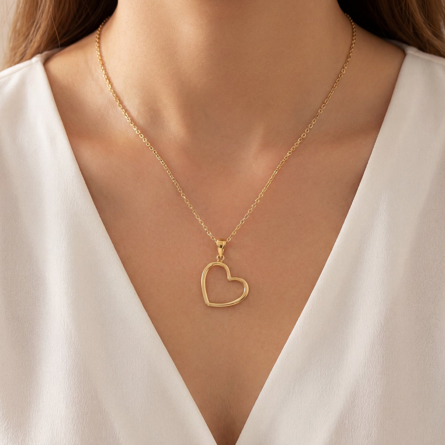 Try on picture of Italian Made Titled Cut Out Yellow Gold Heart Pendant