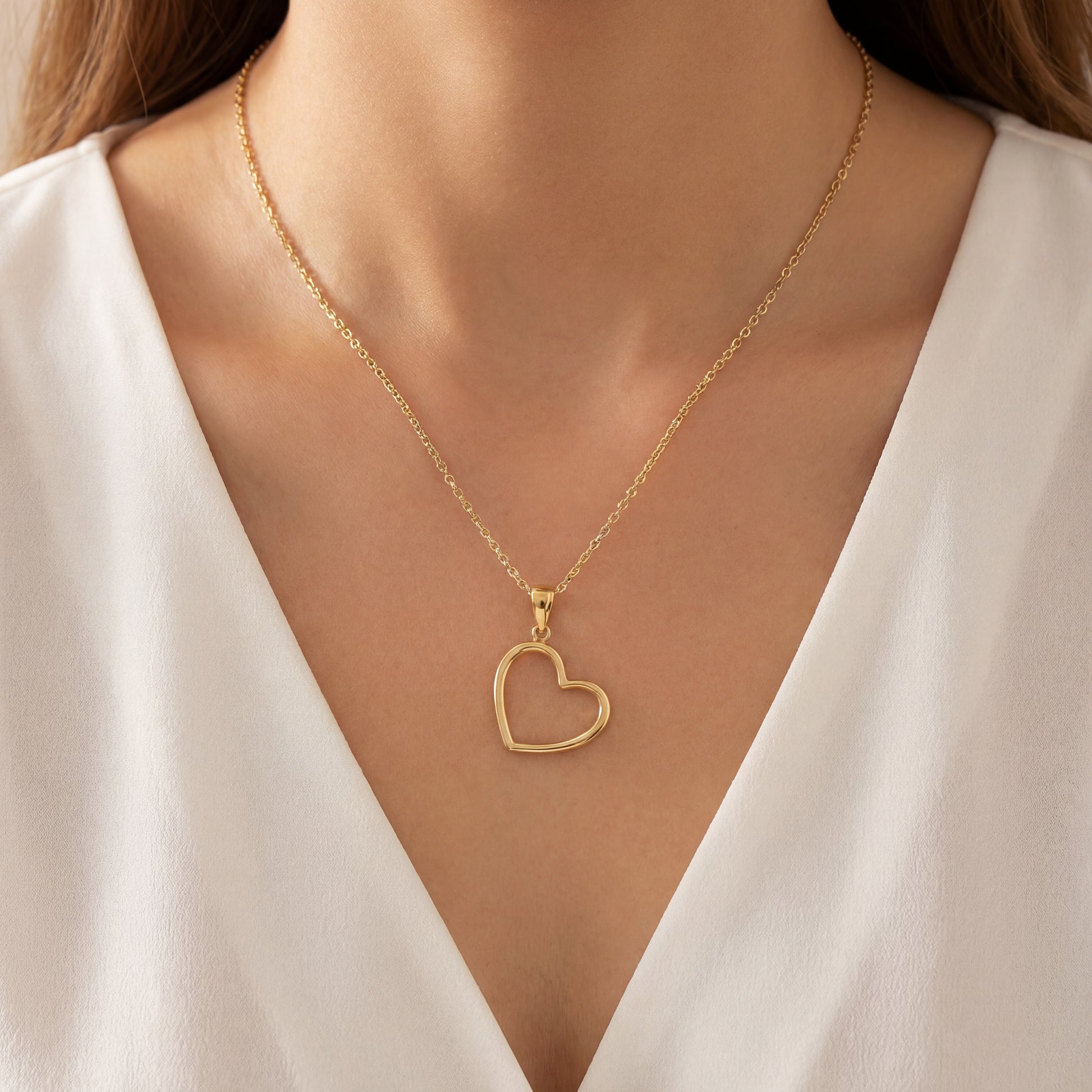 Try on picture of Italian Made Titled Cut Out Yellow Gold Heart Pendant