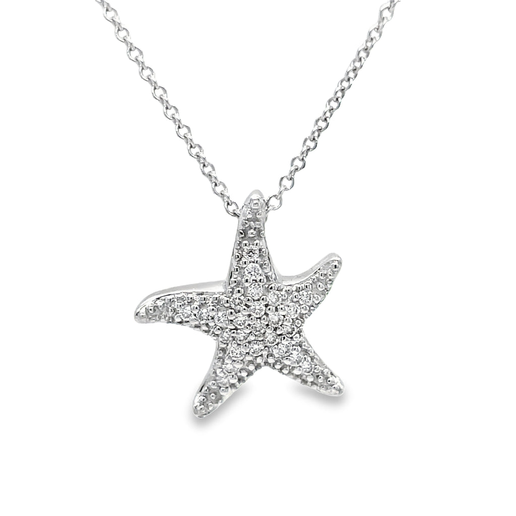 Add a touch of ocean-inspired elegance to your collection with our Diamond Starfish Pendant. The 0.19 ct diamonds set in 14k white gold create a sparkling display 17.00 mm length. Optional 16" chain ($299)  A must-have for any sea lover!"