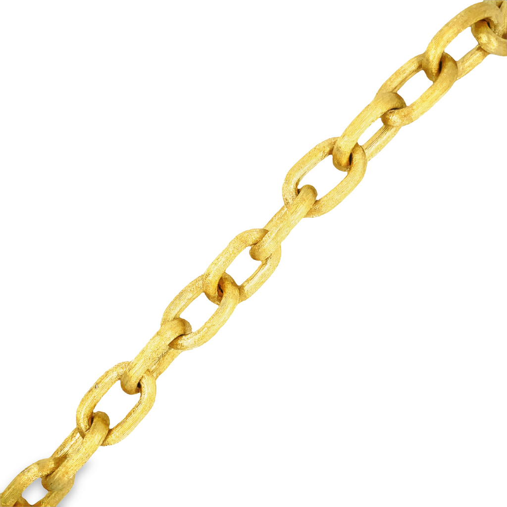 Discover modern elegance with this 18K Italian-made bracelet. The thick open links boast a stylish etched texture and a secure hidden clasp, making it the perfect accessory for the fashion-forward individual.