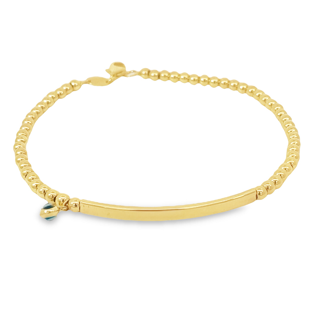 This elegant bracelet is designed for comfort, made with 14k Italian yellow gold and a secure lobster clasp. The beaded style, square bar, and evil eye charm will add an exquisite touch to any look. 7.5" long   