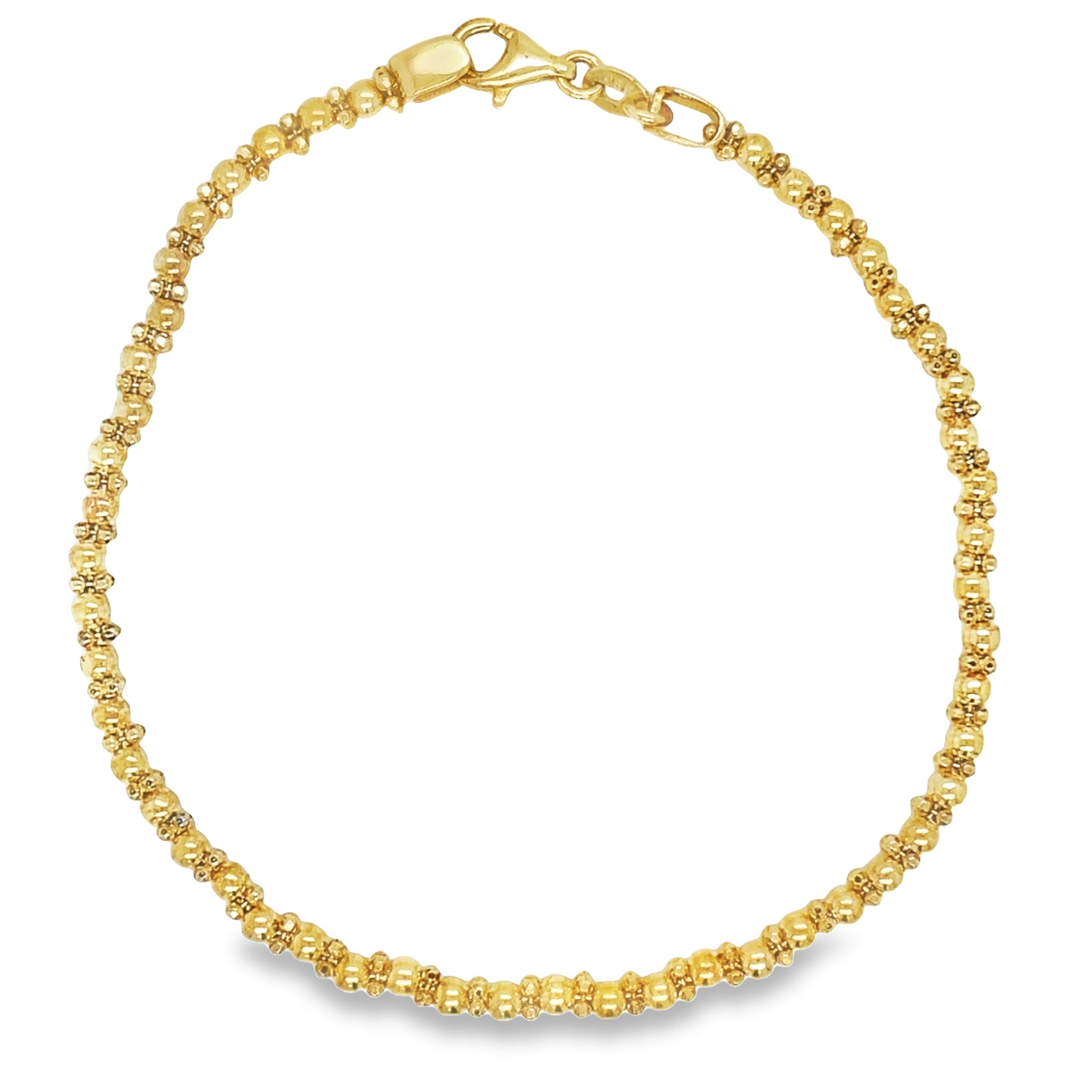 Crafted from luxurious 14k yellow gold, this elegant popcorn bracelet boasts a secure clasp for worry-free wear. Its 7" length sits comfortably on the wrist, while the solid gold construction adds a touch of sophistication. Elevate any outfit with this timeless piece.