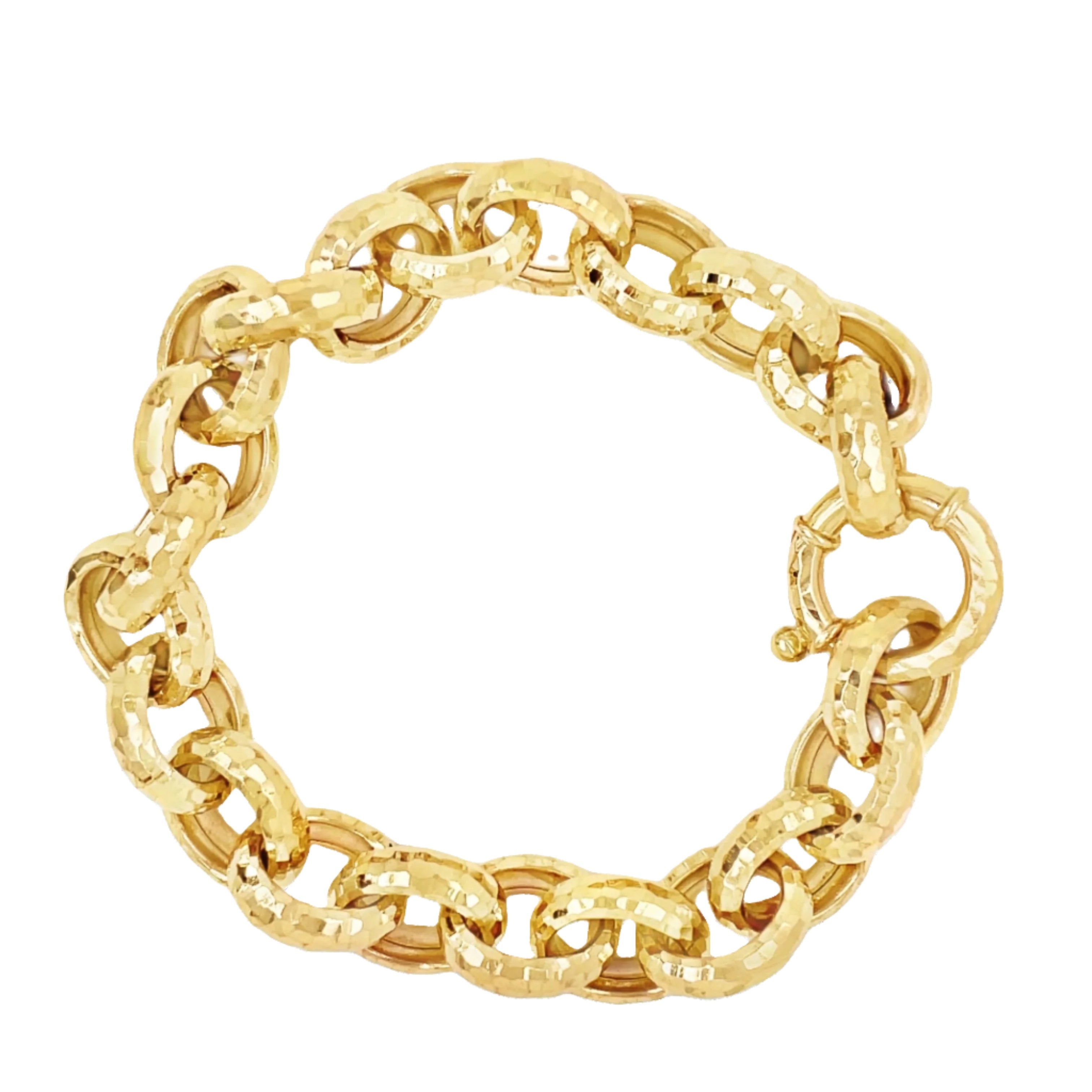 Handmade by Italian artisans, this luxurious 18K bracelet features faceted cable links and a fancy spring clasp. Crafted from 14K yellow gold, it exudes elegance and sophistication. A statement piece to elevate any outfit, this chunky bracelet is truly a work of art and a must-have for any fashion-forward individual.  Starfish pendant is optional #435-264 $2,999