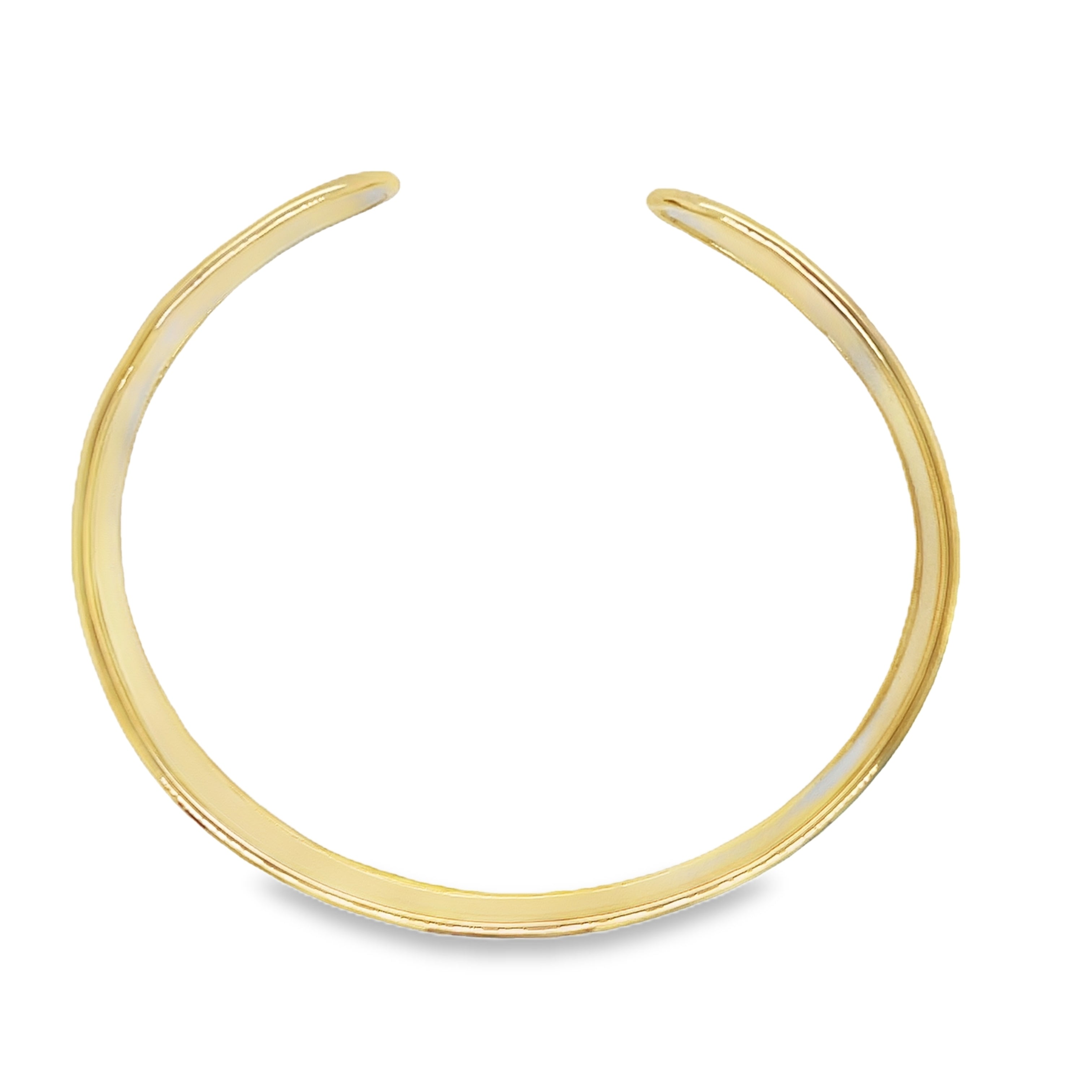 Indulge in the sophistication of this exquisite handmade, 14k yellow gold cuff bangle. Its lustrous matte finish adds a touch of elegance to this cuff bracelet, weighing 17.4 dwt. Experience luxury and craftsmanship at its finest with this exclusive piece.