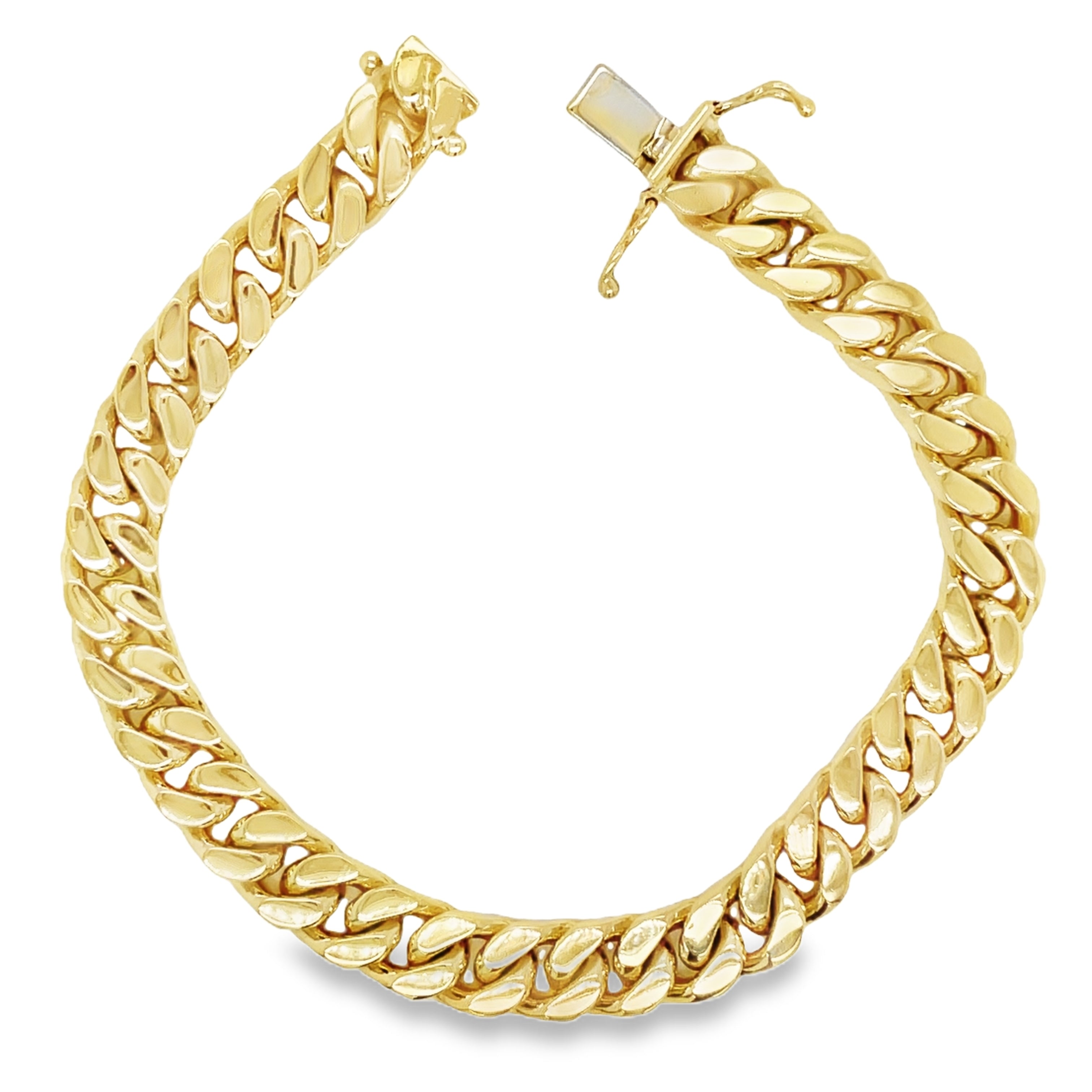 Indulge in luxury with our 14K Cuban Curb Link Yellow Gold Bracelet. Crafted in 14k yellow gold, this bracelet features a sophisticated curb link design and is secured with a box clasp and figure eight closure. With a weight of 30.9 dwt, this bracelet is not only stunning but also substantial. Elevate any outfit with this exclusive and tasteful piece.