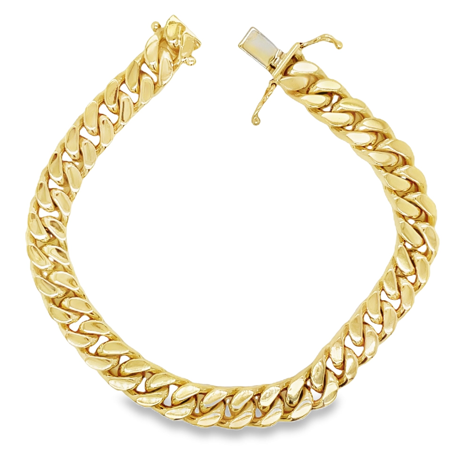 Top view of unfastened 18K Cuban Curb Link Yellow Gold Bracelet 31.0 dtw