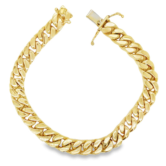 Top view of unfastened 18K Cuban Curb Link Yellow Gold Bracelet 31.0 dtw