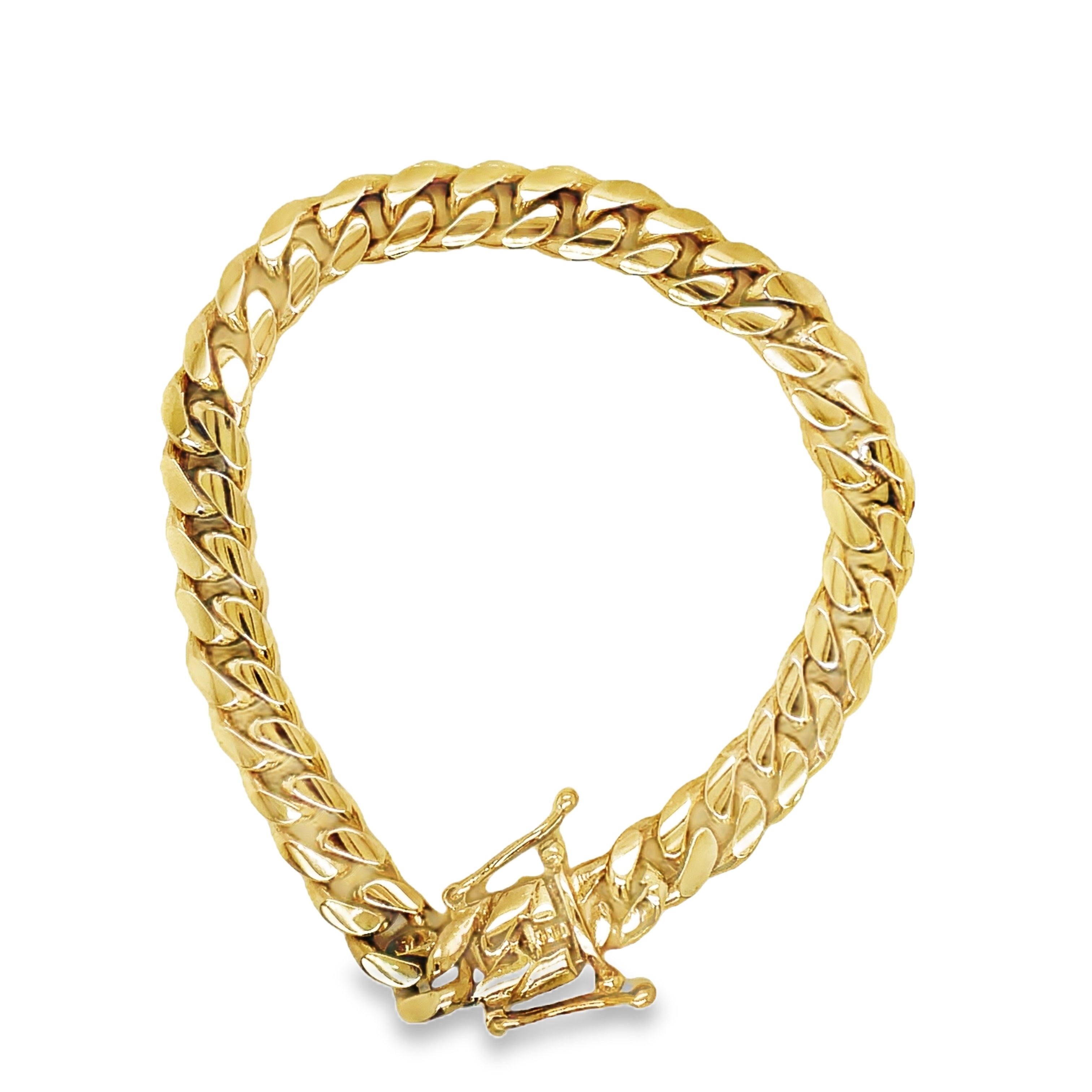 Indulge in luxury with our 14K Cuban Curb Link Yellow Gold Bracelet. Crafted in 14k yellow gold, this bracelet features a sophisticated curb link design and is secured with a box clasp and figure eight closure. With a weight of 21.50 dwt, this bracelet is not only stunning but also substantial. Elevate any outfit with this exclusive and tasteful piece