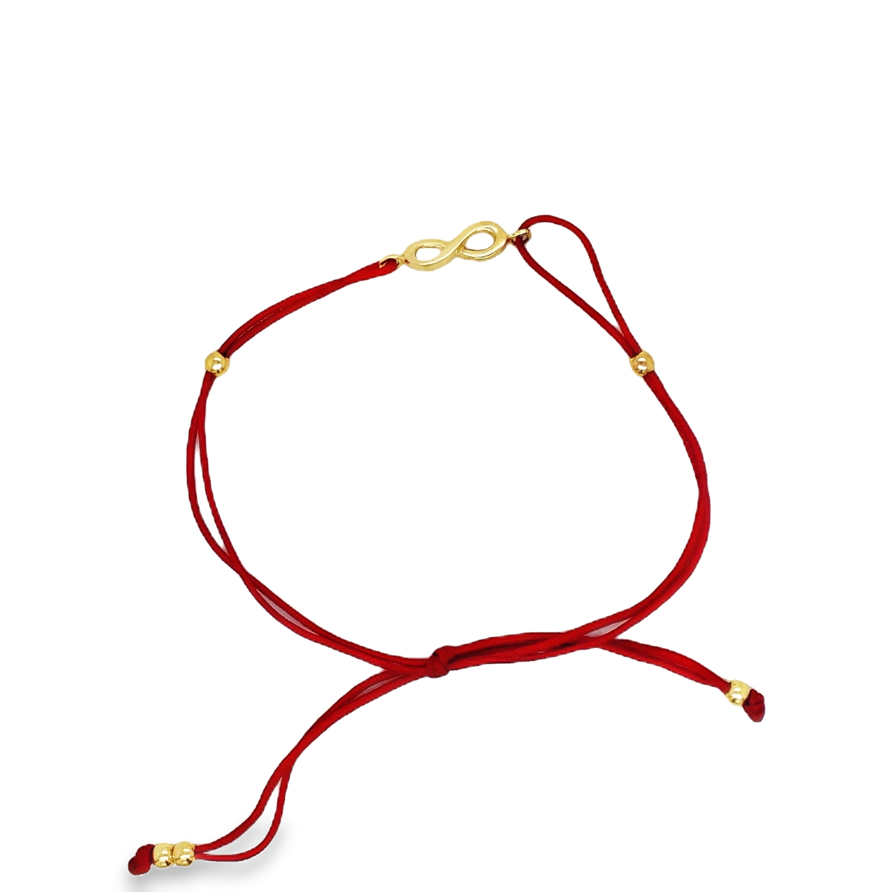 Add a touch of elegance to your look with our Dainty Yellow Gold Infinity Cord Bracelet. Crafted from 14k yellow gold and adorned with the symbolic infinity sign, this bracelet represents endless love and boundless possibilities. The adjustable red cord allows for a perfect fit, making it a versatile and stylish accessory for any occasion.