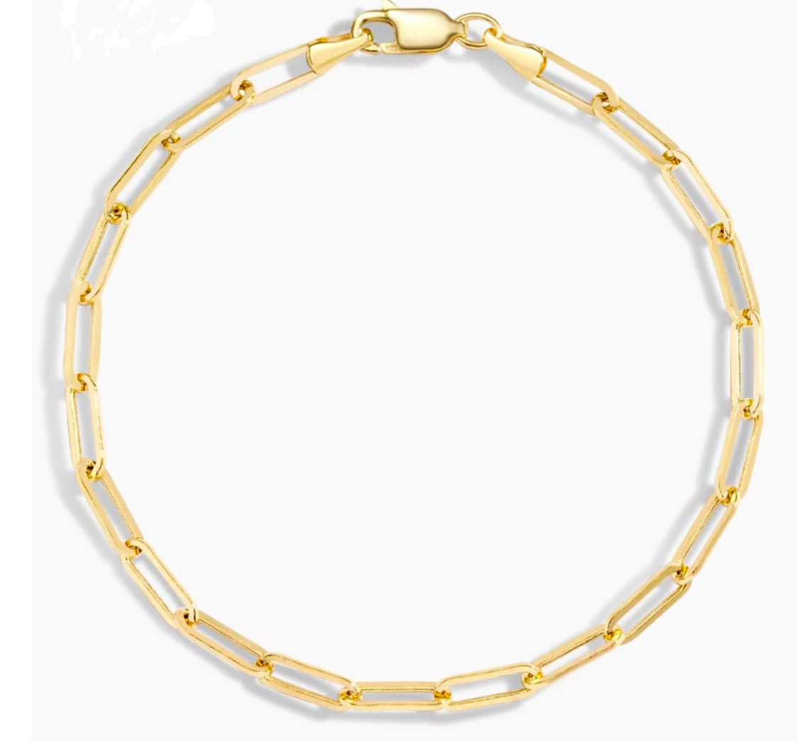 ndulge in luxury with our 14K Yellow Gold Paper Clip Bracelet. Crafted with 14k yellow gold, its elegant paper clip links and secure lobster clasp add a touch of sophistication to any outfit. Measuring at 8" in length and 4.00 mm in thickness, it's the perfect statement piece for any occasion.