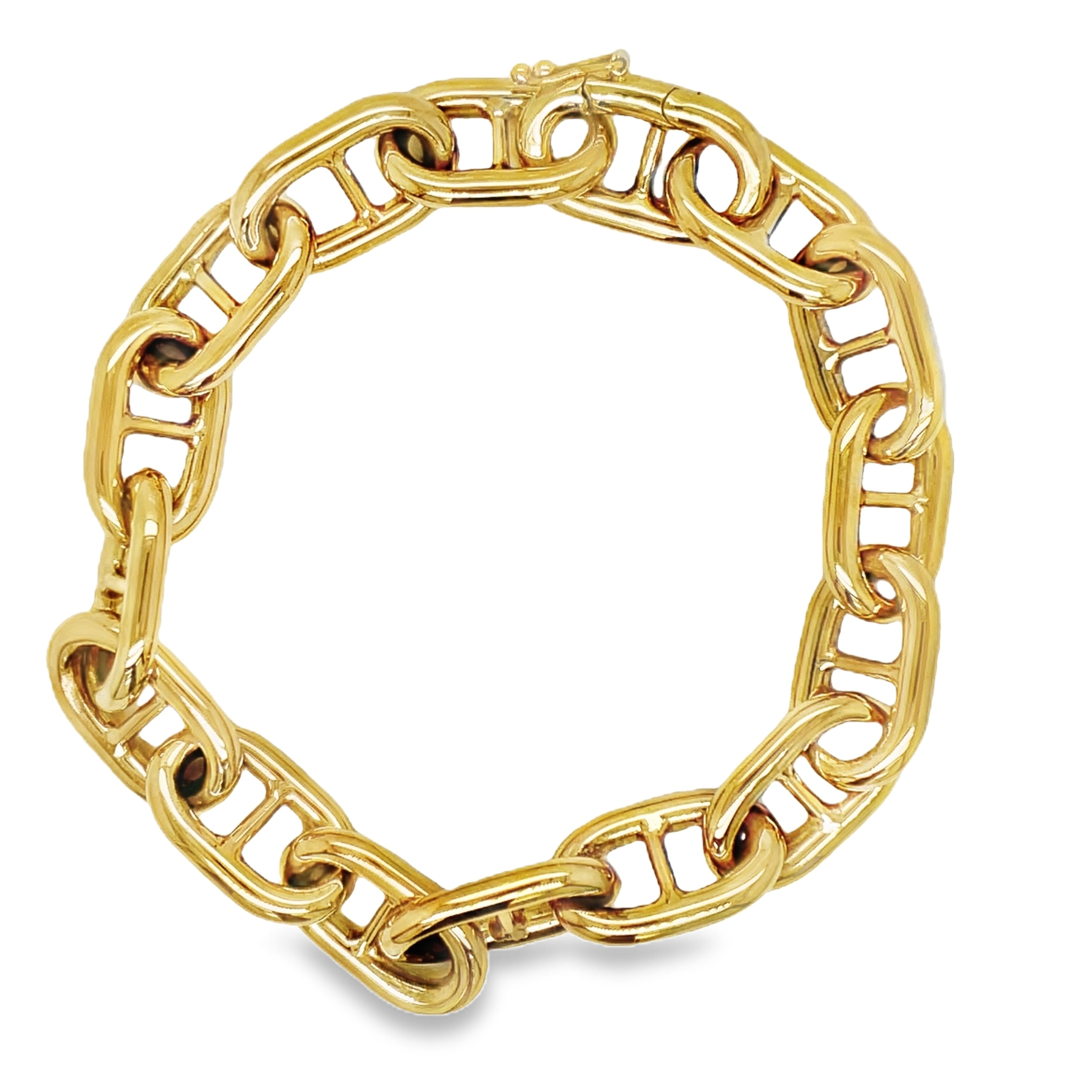 ndulge in luxury with our 18k Italian Solid and Thick Mariner Link Bracelet. Handcrafted in Italy, this bracelet boasts a striking 18k yellow gold finish and a distinctive mariner link design. The solid construction and 11.00 mm thickness add to its opulent feel. With a hidden clasp, it exudes an air of exclusivity. Elevate your style with this timeless piece.