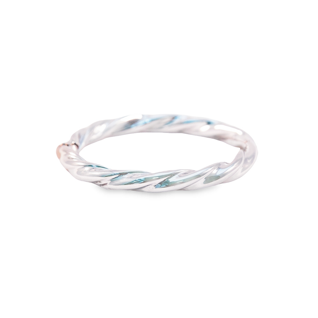This White Gold Wide Twisted Bangle is the perfect accessory. Its twisted design adds texture and dimension to any look, while a comfortable and chunky design allows for all-day wear. Enjoy the sophistication of a luxury bangle without sacrificing comfort.
