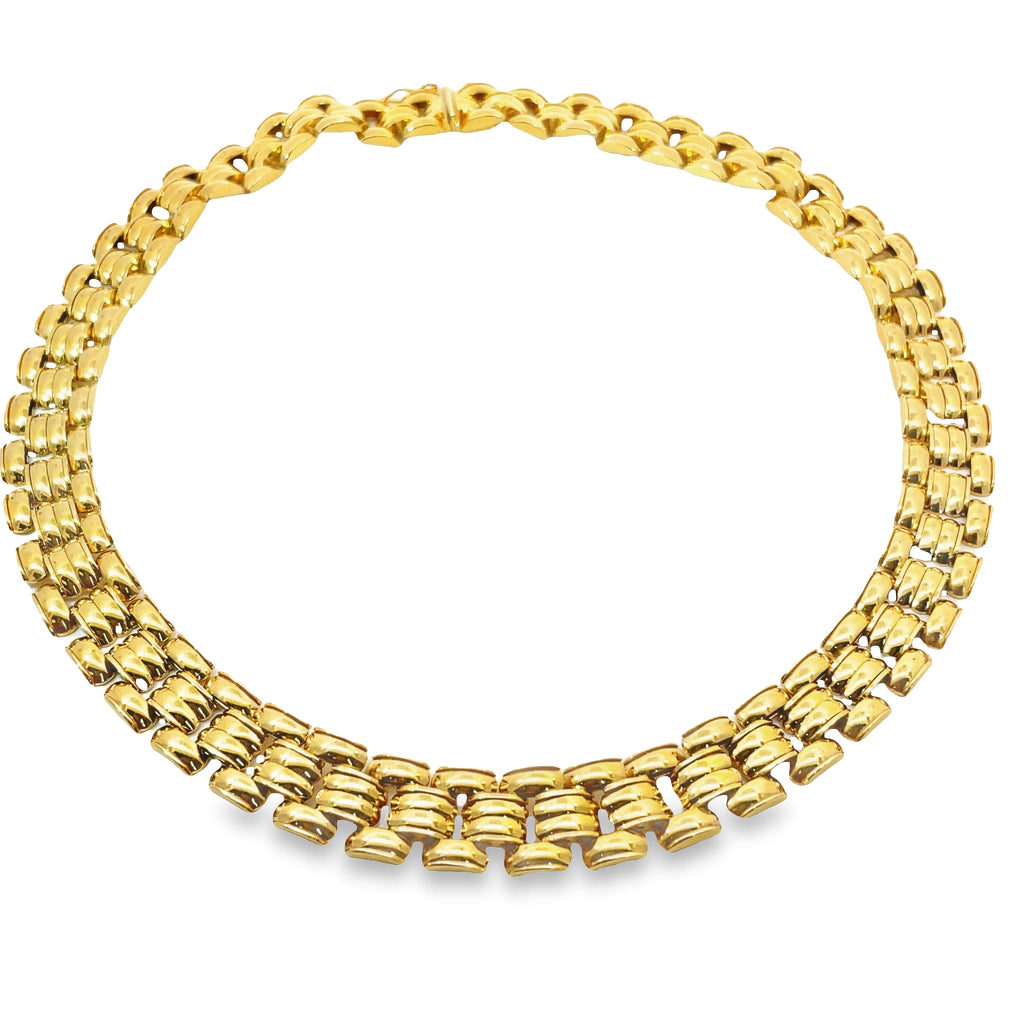 This Panther Link 3 Row Italian Made Necklace is crafted with the highest quality yellow gold and measures 15 mm wide. It has a hidden clasp for added security and durability, making it a perfect long-term accessory. Enjoy the combination of Italian craftsmanship and timeless style.