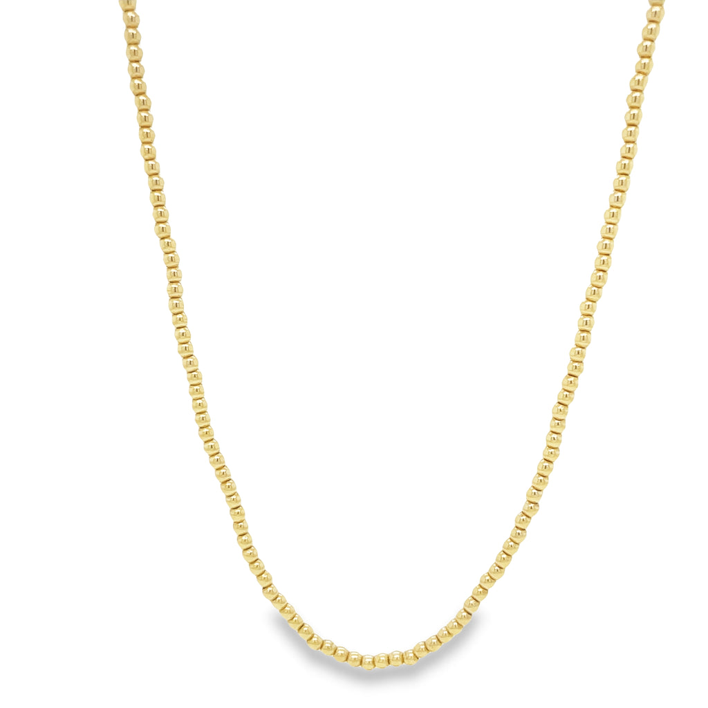 This beautiful 14k Italian Yellow Gold Bead Link Chain Necklace is 16" long and features 2.00 mm beads. Its classic design and top-quality gold make it a durable and timeless piece.