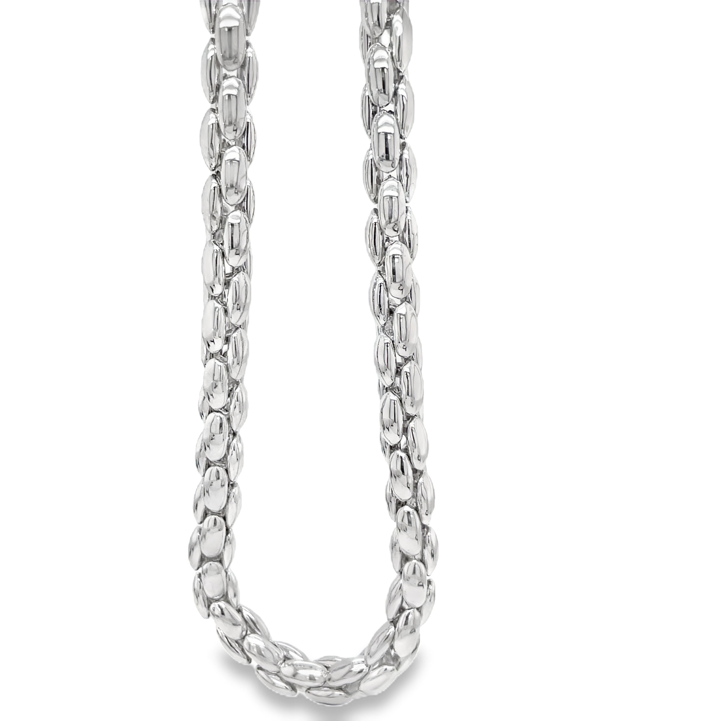 Unleash your inner elegance with our Italian made Madde 14K White Gold Round Chain Link Necklace. Crafted from 14k white gold, this 20" long necklace boasts a sophisticated round chain link design. Elevate any outfit with this premium accessory.