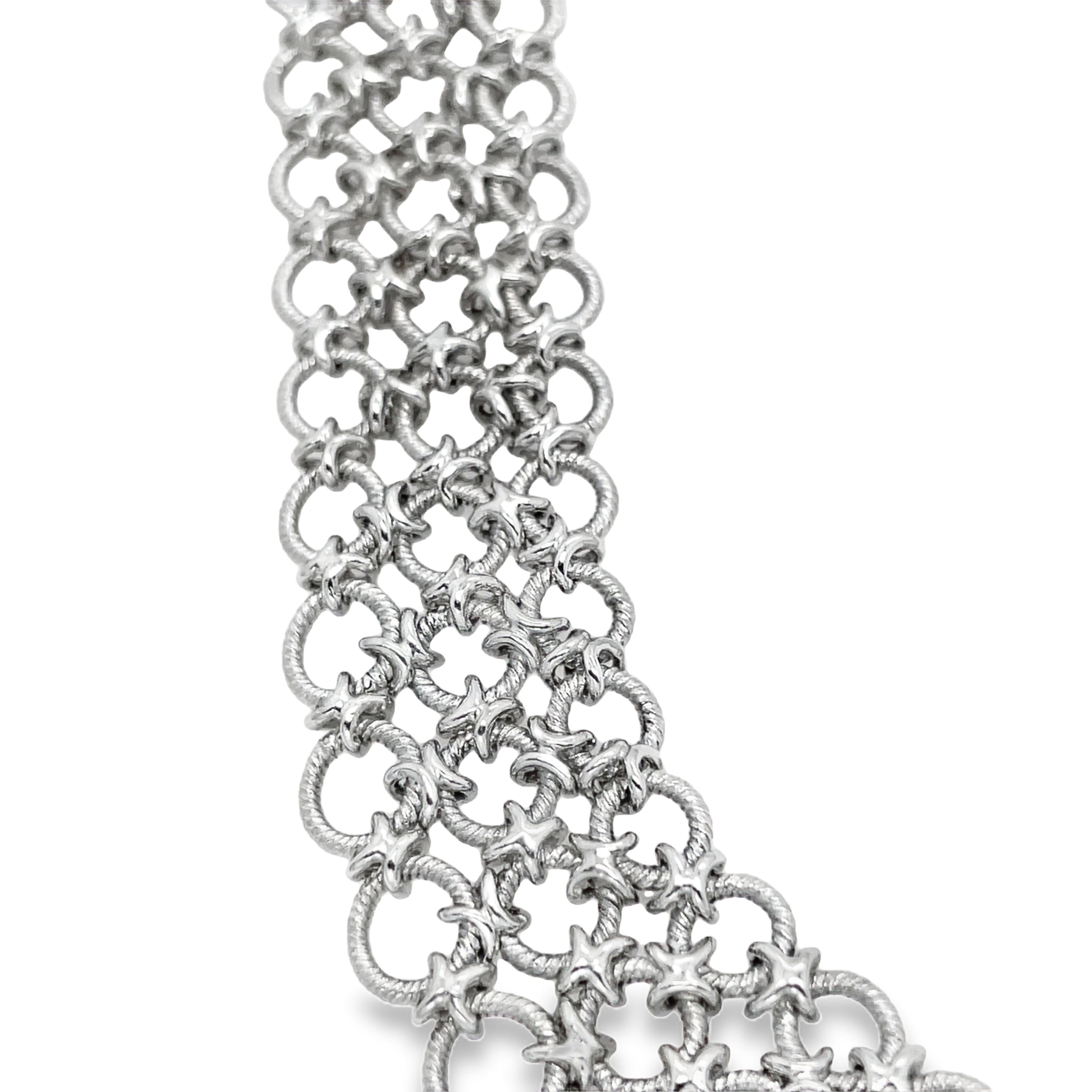 Adorn your neck with our exquisite Italian Made Platinum Choker Necklace. Crafted with premium platinum, this luxurious piece features a secure hidden clasp and a unique three row circle design. Its matte finish and woven style add a touch of sophisticated elegance. Elevate your style with this exclusive necklace.