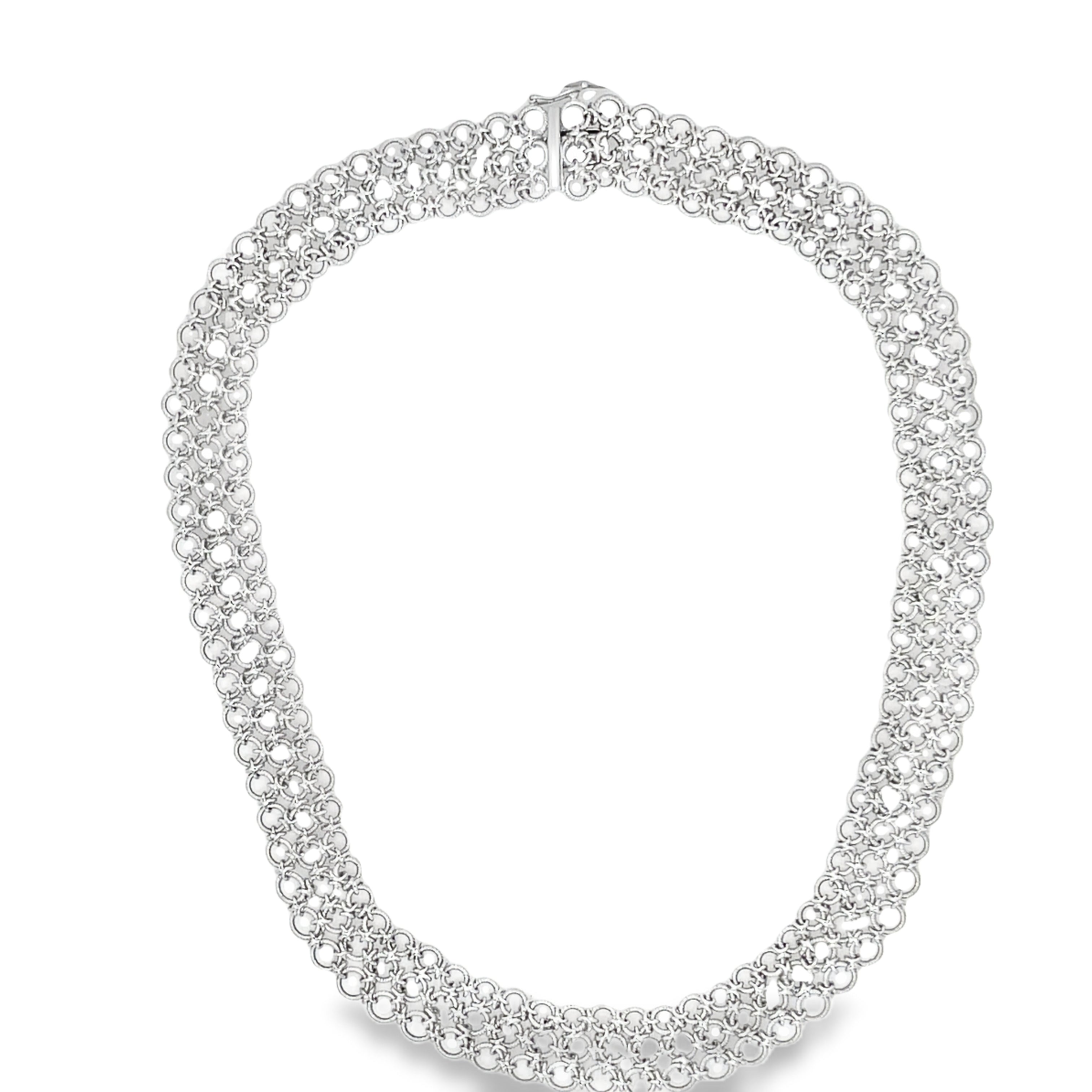 Adorn your neck with our exquisite Italian Made Platinum Choker Necklace. Crafted with premium platinum, this luxurious piece features a secure hidden clasp and a unique three row circle design. Its matte finish and woven style add a touch of sophisticated elegance. Elevate your style with this exclusive necklace.