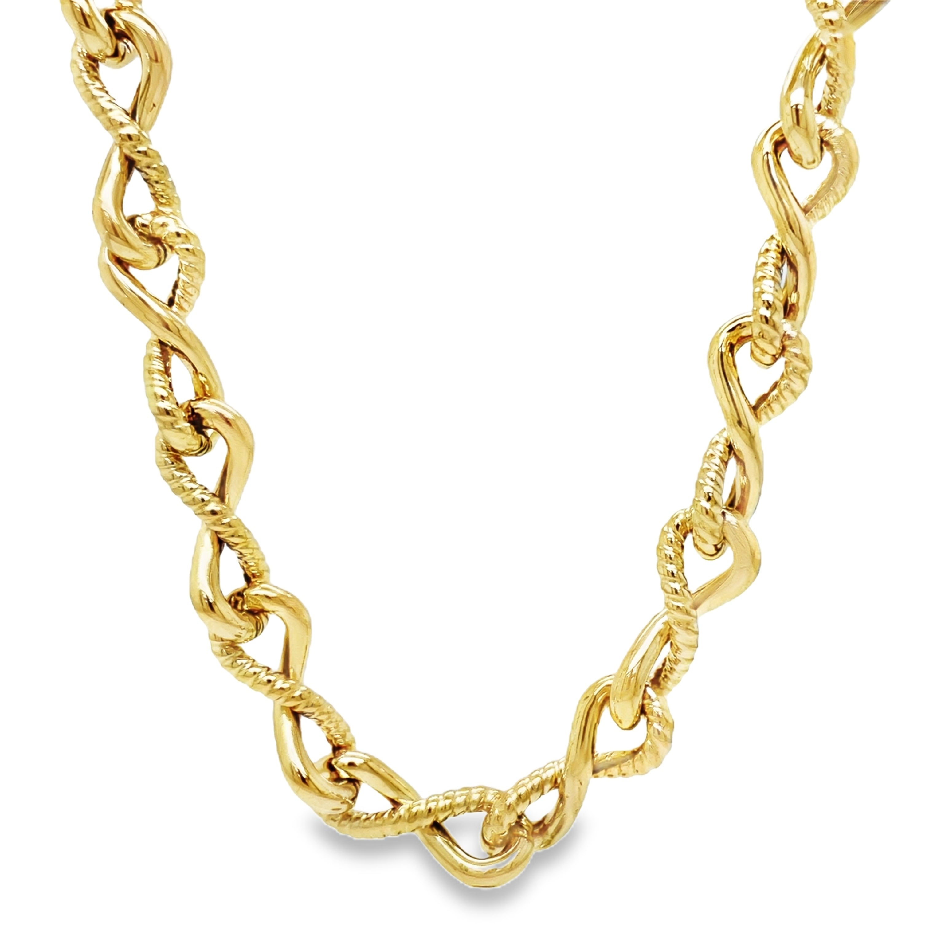 Welcome to luxury with our 14K Italian Gold Fancy Corrugated Link Chain Necklace. Made in Italy, this 18" necklace features a unique corrugated style and is crafted from 14k yellow gold, totaling 22.9 grams. Elevate your style and exude sophistication with this exquisite piece.