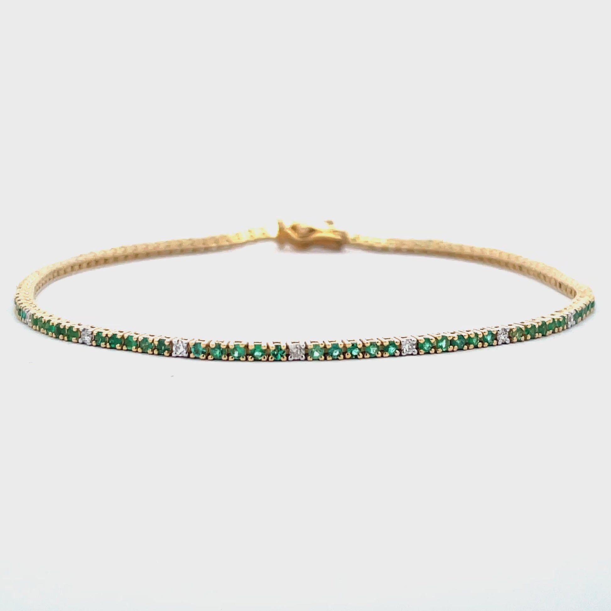 Try on video of 14k Yellow Gold Emerald & Diamond Line Bracelet 