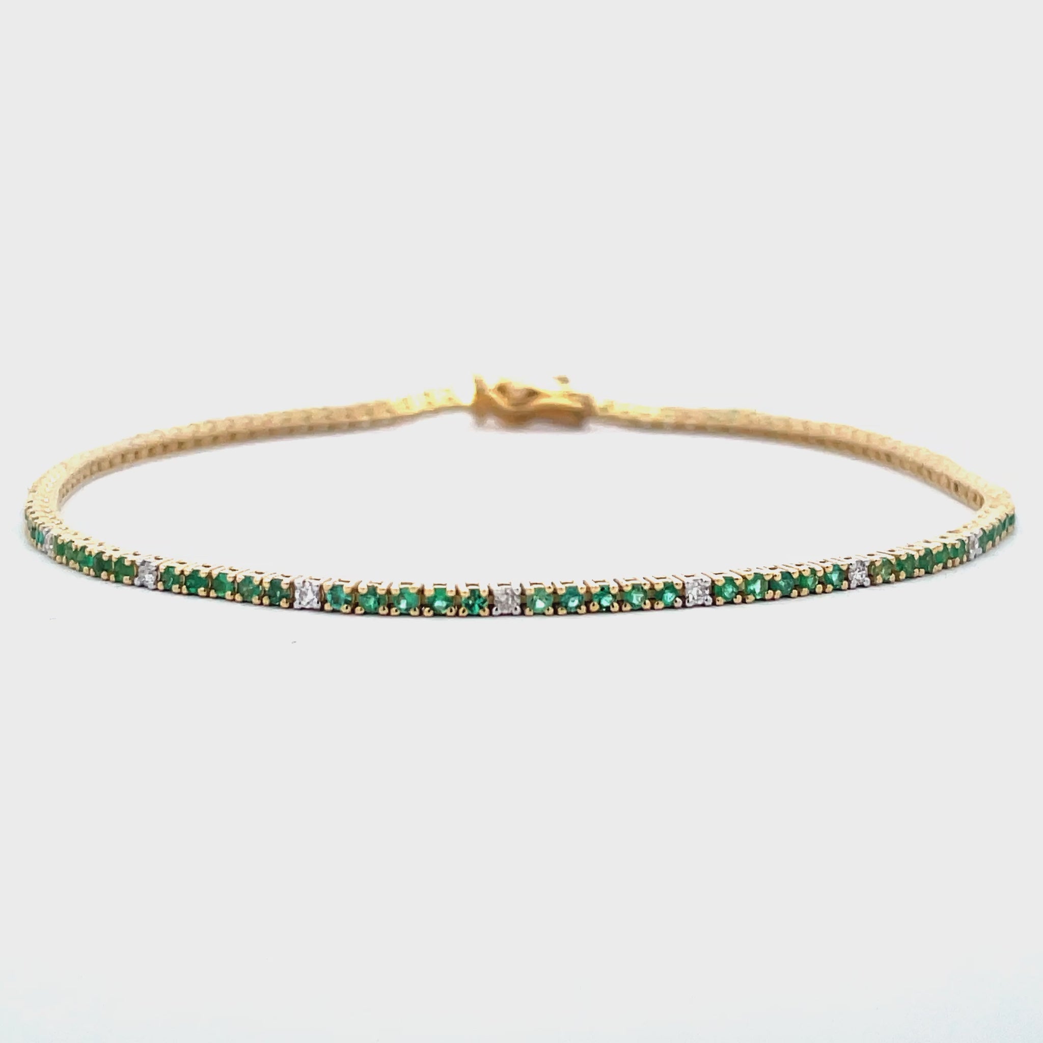 Try on video of 14k Yellow Gold Emerald & Diamond Line Bracelet 