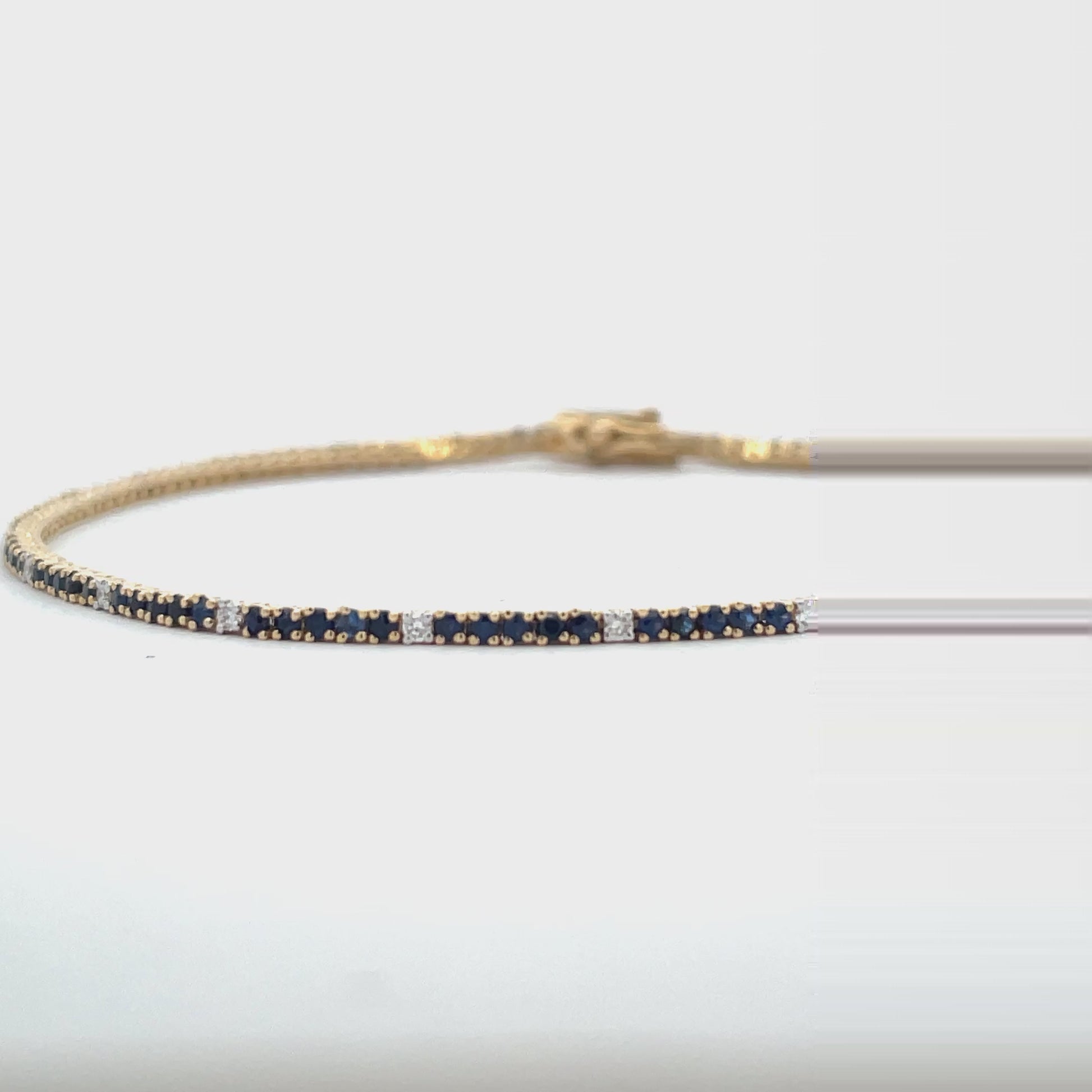 Try on video of 14k Yellow Gold Sapphire & Diamond Line Bracelet 