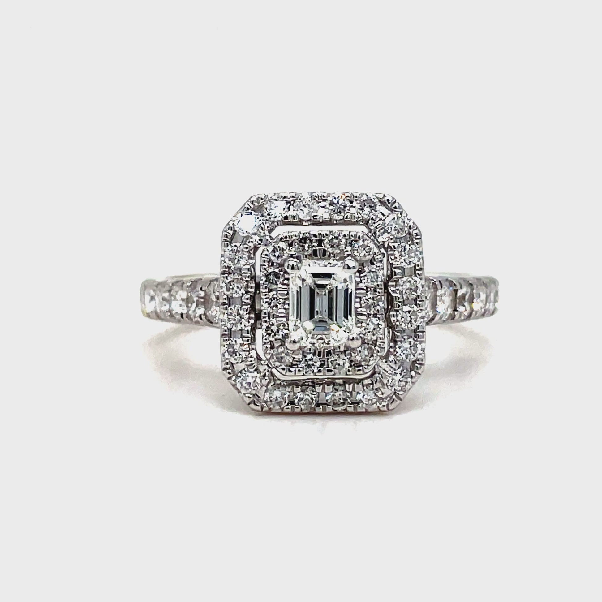 Indulge in pure luxury with our Round and Baguette Diamond Engagement Ring. Crafted with 14k white gold, it features a stunning double diamond bezel and a brilliant baguette center stone of 0.25 cts, surrounded by 1.10 cts of sparkling round diamonds. Elevate your style and make a statement with this exquisite and exclusive piece.