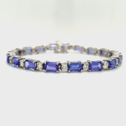 Indulge in luxury with our Fine Diamond &amp; Tanzanite Rectangular Shape Bracelet. Crafted with 14k white gold, this stunning piece features a radiant 11.35 cts rectangular tanzanite gem and sparkling round diamonds. Elevate any outfit with this exquisite bracelet that exudes sophistication and exclusivity.