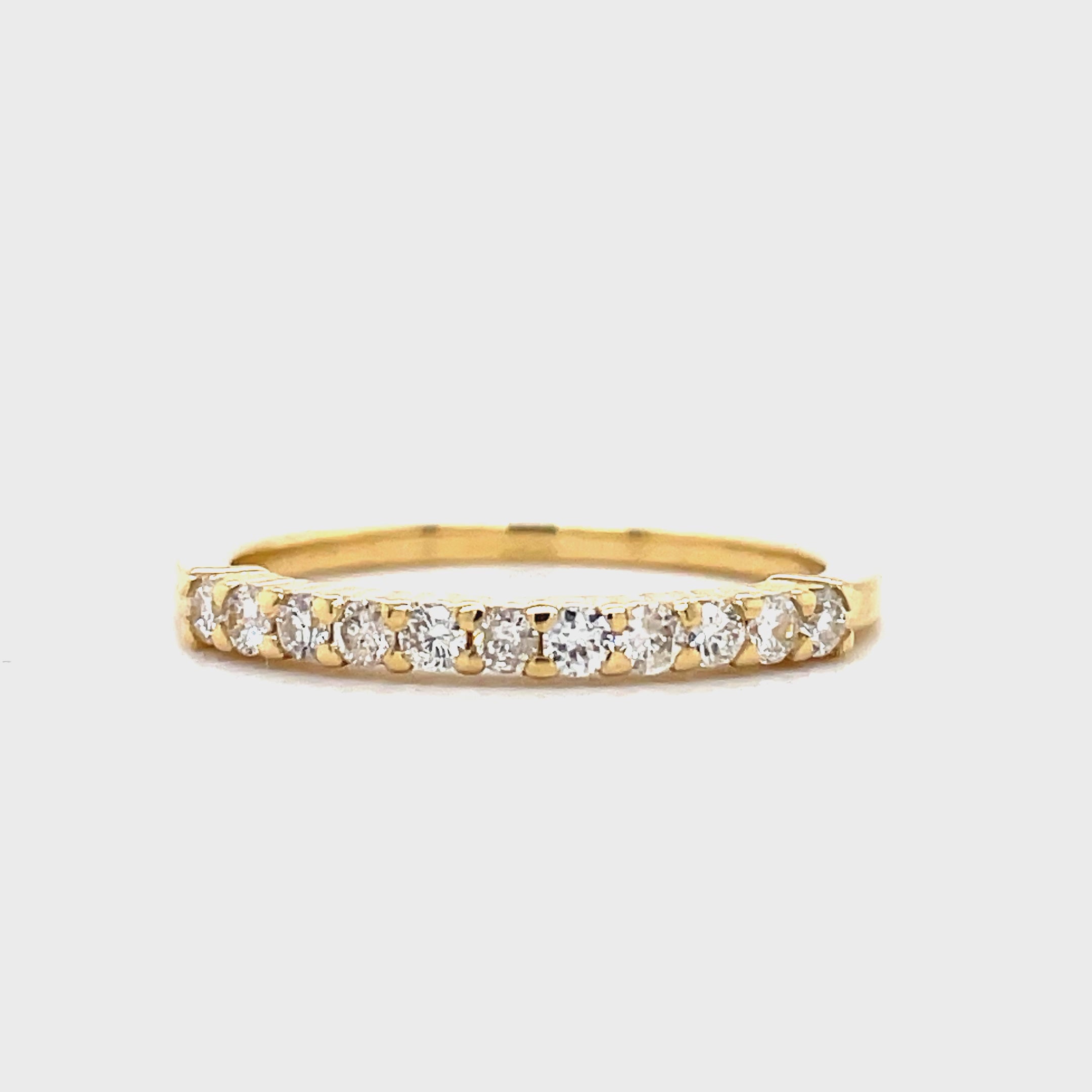 Celebrate your love with our Anniversary Diamond Ring. The 0.44 cts of round diamonds sparkle on a band of 14k yellow gold. This luxurious piece is a timeless symbol of your enduring commitment.