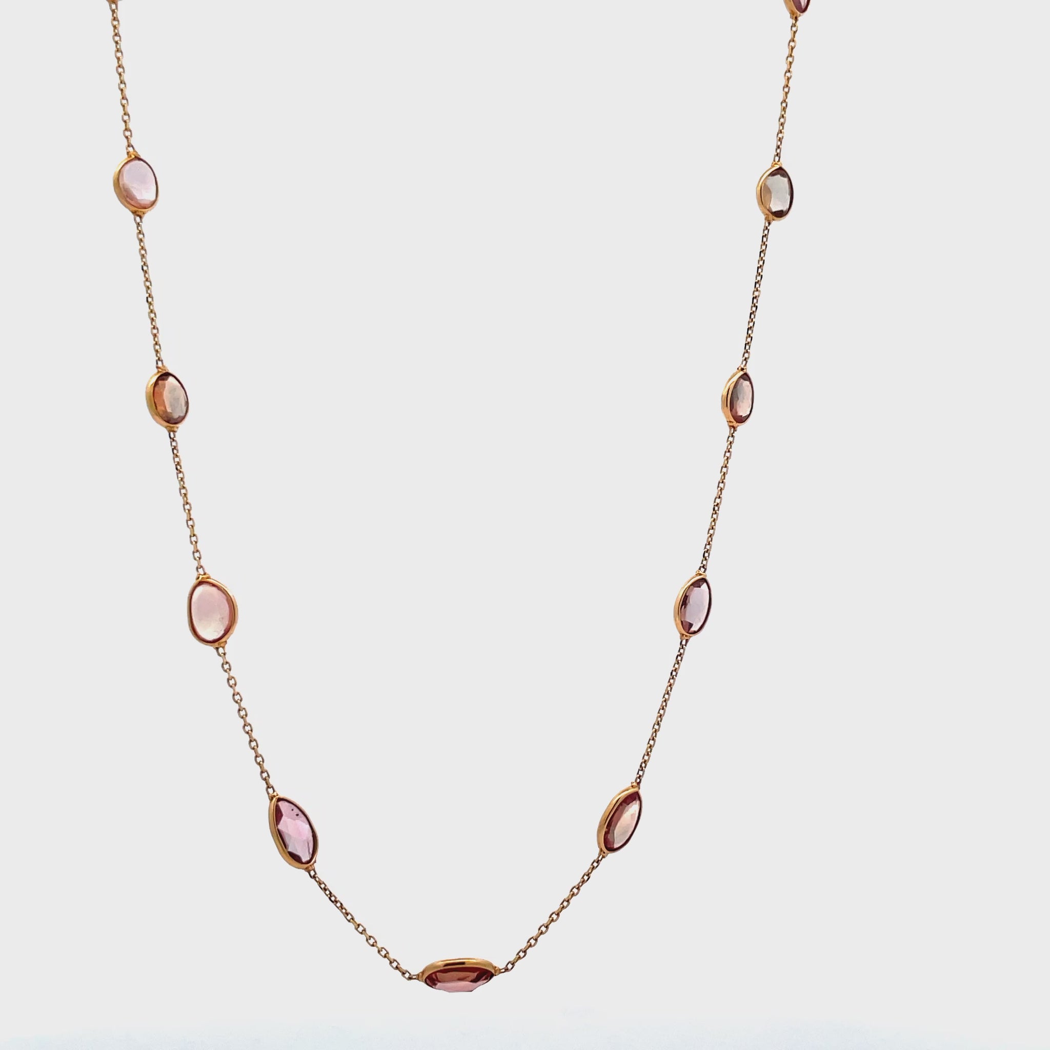 Try on video of 18k Yellow Gold Cabochon Pink Sapphire Cabochon By The Yard Necklace 6.05 cts