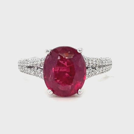 Adorn your hand with sophisticated glamour with our Oval Burmese Ruby and Diamond Ring. Crafted in platinum, the eye-catching centerpiece is a Burmese oval ruby of 2.58 carats, beautifully framed by 1.20 carats of dazzling round diamonds. Experience timeless elegance with this exquisite piece