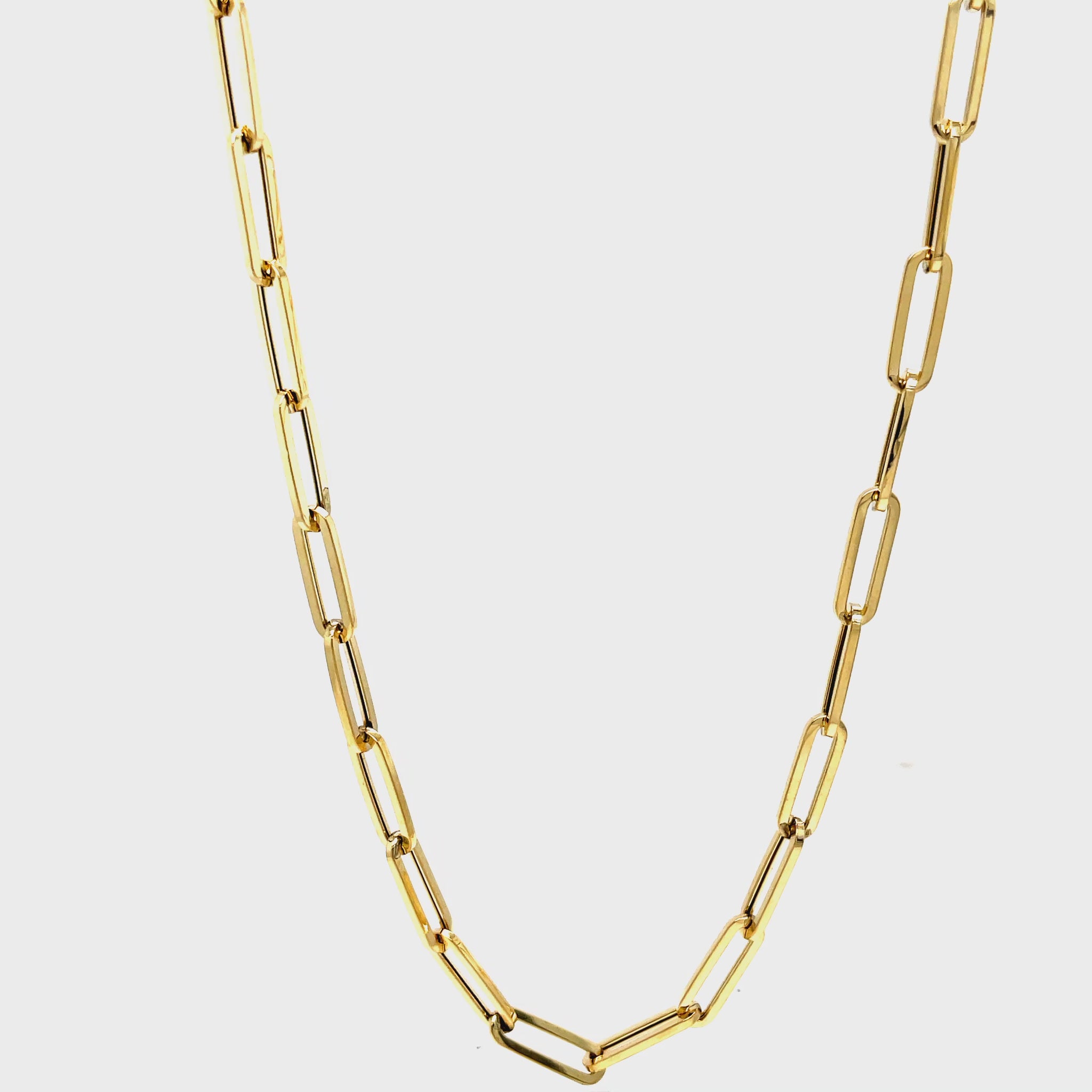 Indulge in sophistication with our 14K Italian Paperclip Link Chain Necklace. Made in Italy from luxurious 14k yellow gold, this 18" necklace features small open links that add a touch of elegance. Weighing in at 6.5 grams, it's a truly exclusive piece to add to your collection.