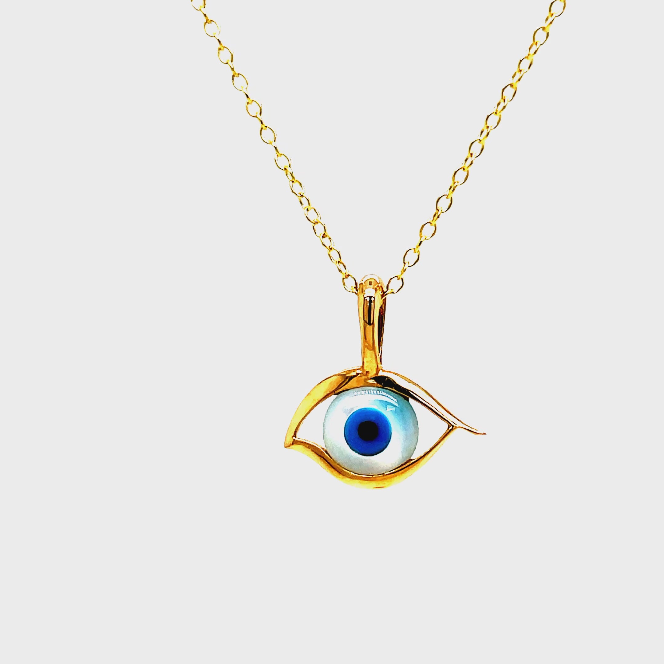 ndulge in elegance with our 14k Round Evil Eye Pendant Necklace. Handcrafted from luxurious 14k yellow gold, this necklace features a mesmerizing round evil eye pendant that will add a touch of sophistication to any outfit. Protect yourself from negative energies while exuding style and grace. A must-have for any fashion-forward individual.