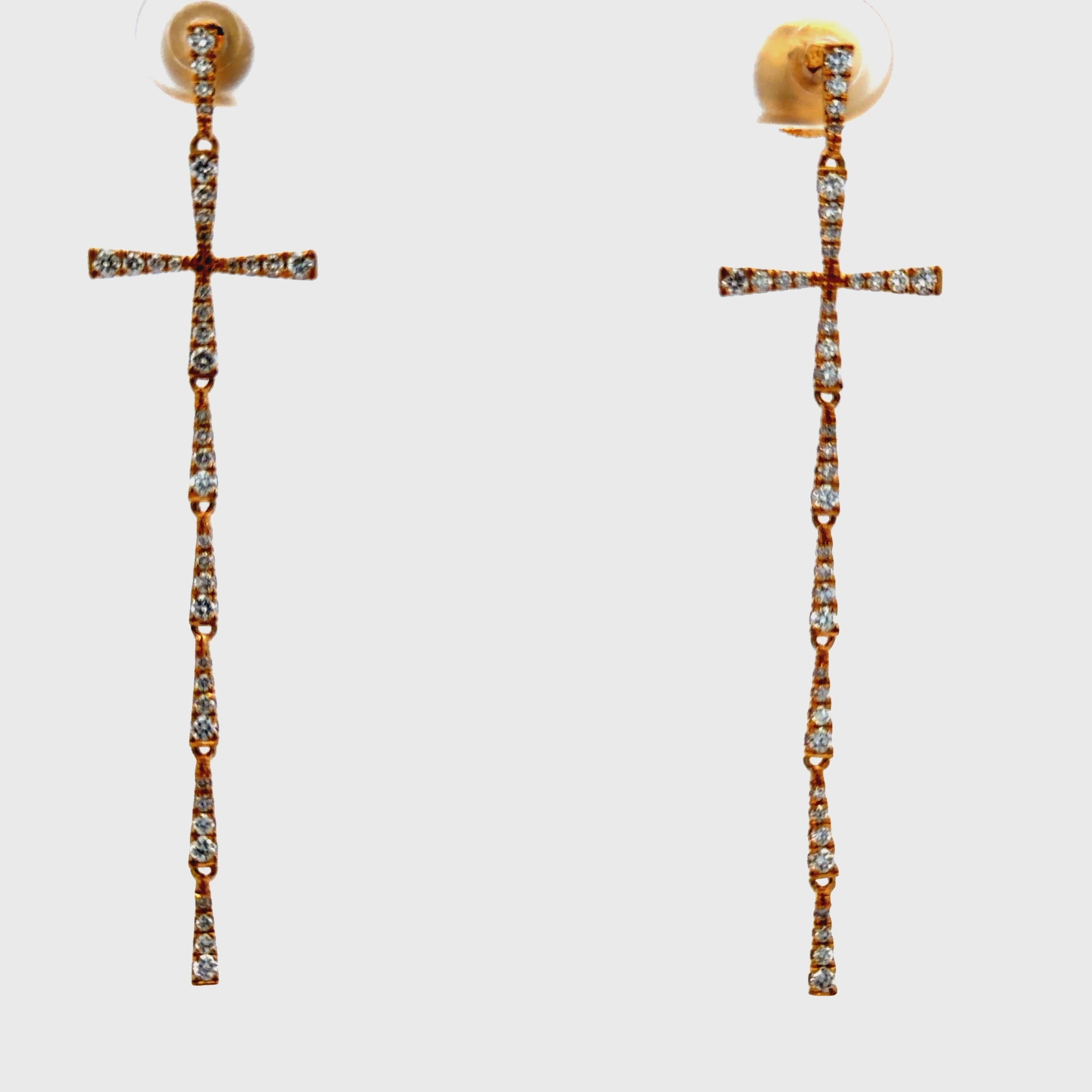 Try on video of 18k Elongated Diamond Cross Drop Earrings in Yellow Gold