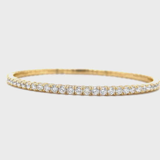 Try on video of diamond flexible yellow gold bangle 2.25 cts 