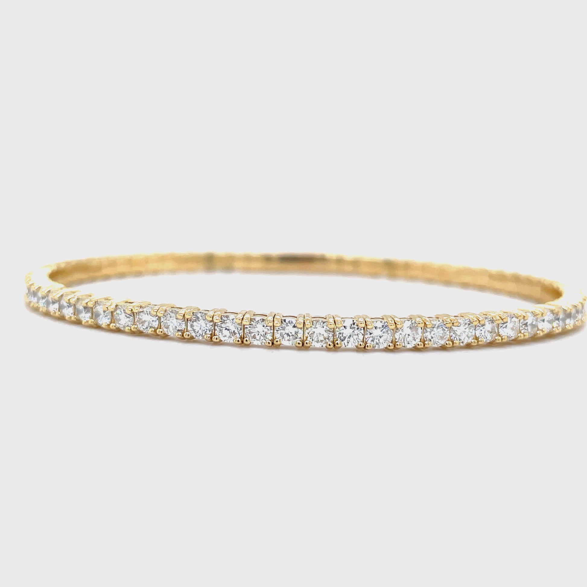 Try on video of diamond flexible yellow gold bangle 2.25 cts 