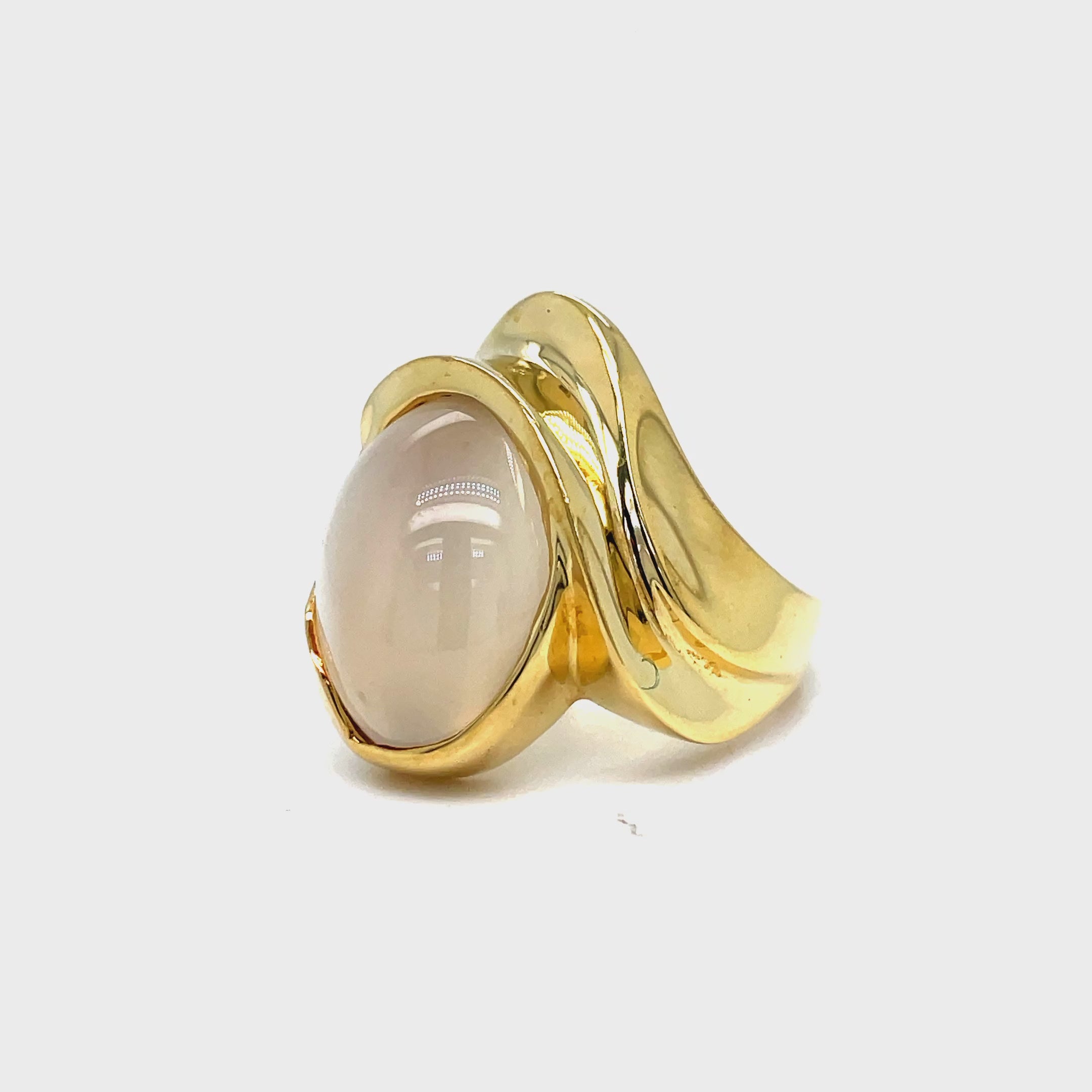 Introducing our exclusive Cat Eye Chrysoberyl Cabochon Yellow Gold Ring. This unique ring features a stunning cabochon cut chrysoberyl stone set in luxurious 18k yellow gold. The chunky style adds a touch of sophistication and elegance to any outfit. Elevate your jewelry collection with this one-of-a-kind piece.