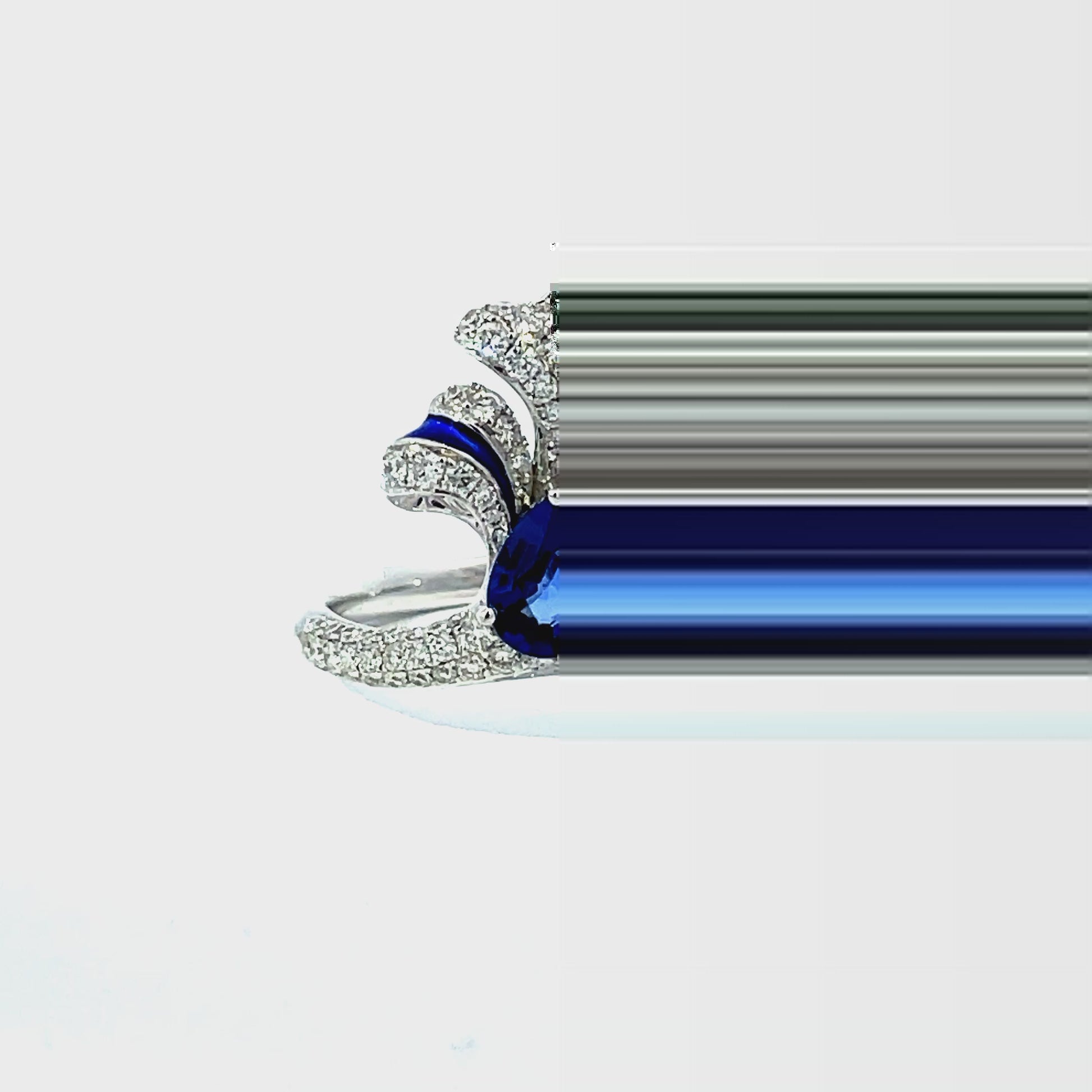 Try on video of Front of 18k white Gold Sapphire and Diamond Feather Enamel Ring