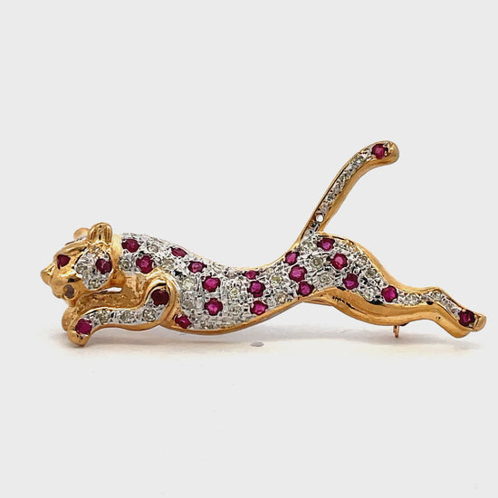 Try on video of Estate Collection 14k Yellow Gold Ruby and Diamond Panther Brooch 
