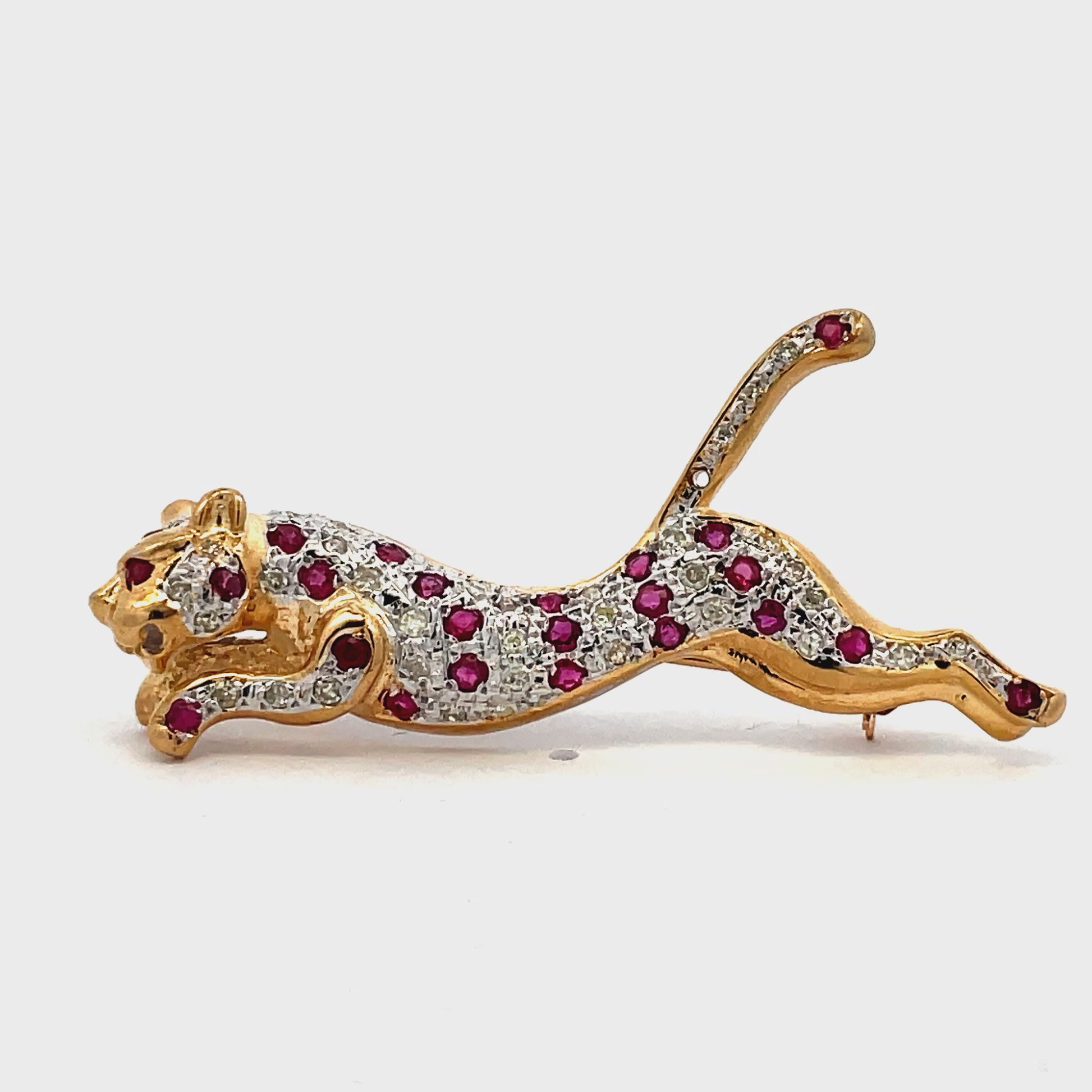 Try on video of Estate Collection 14k Yellow Gold Ruby and Diamond Panther Brooch 