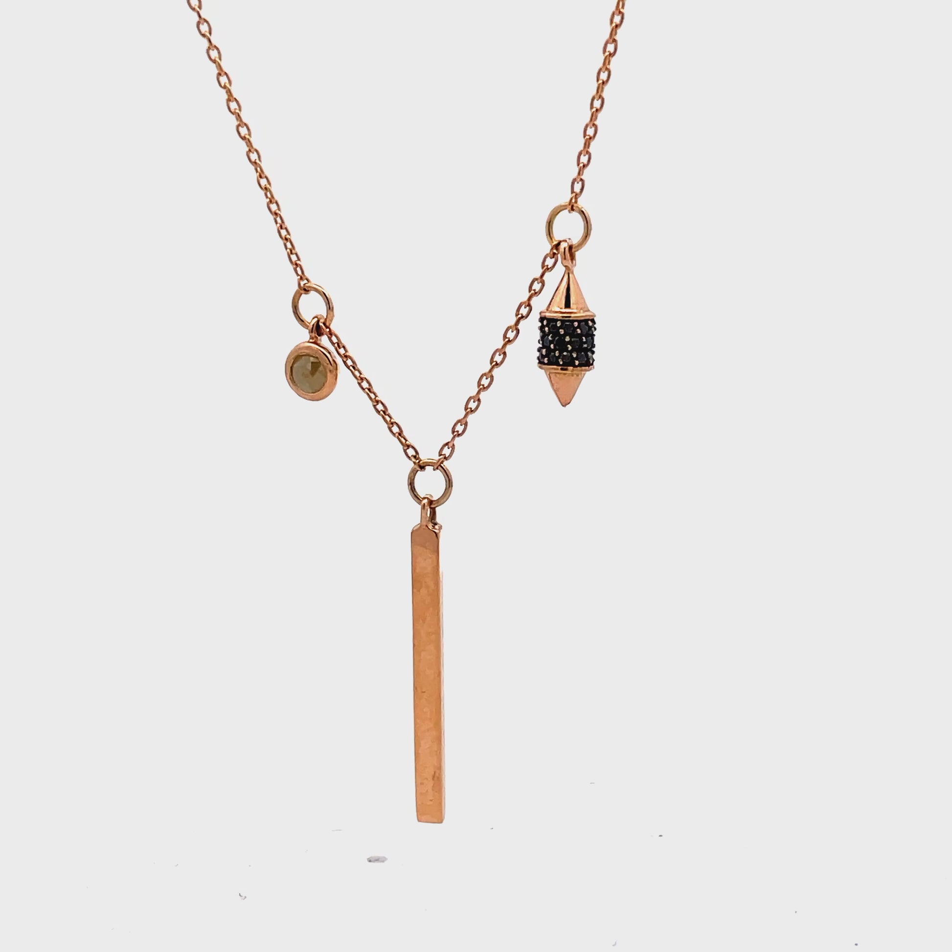 Try on video of 18k Rose Gold Bar & Black Diamond Necklace 