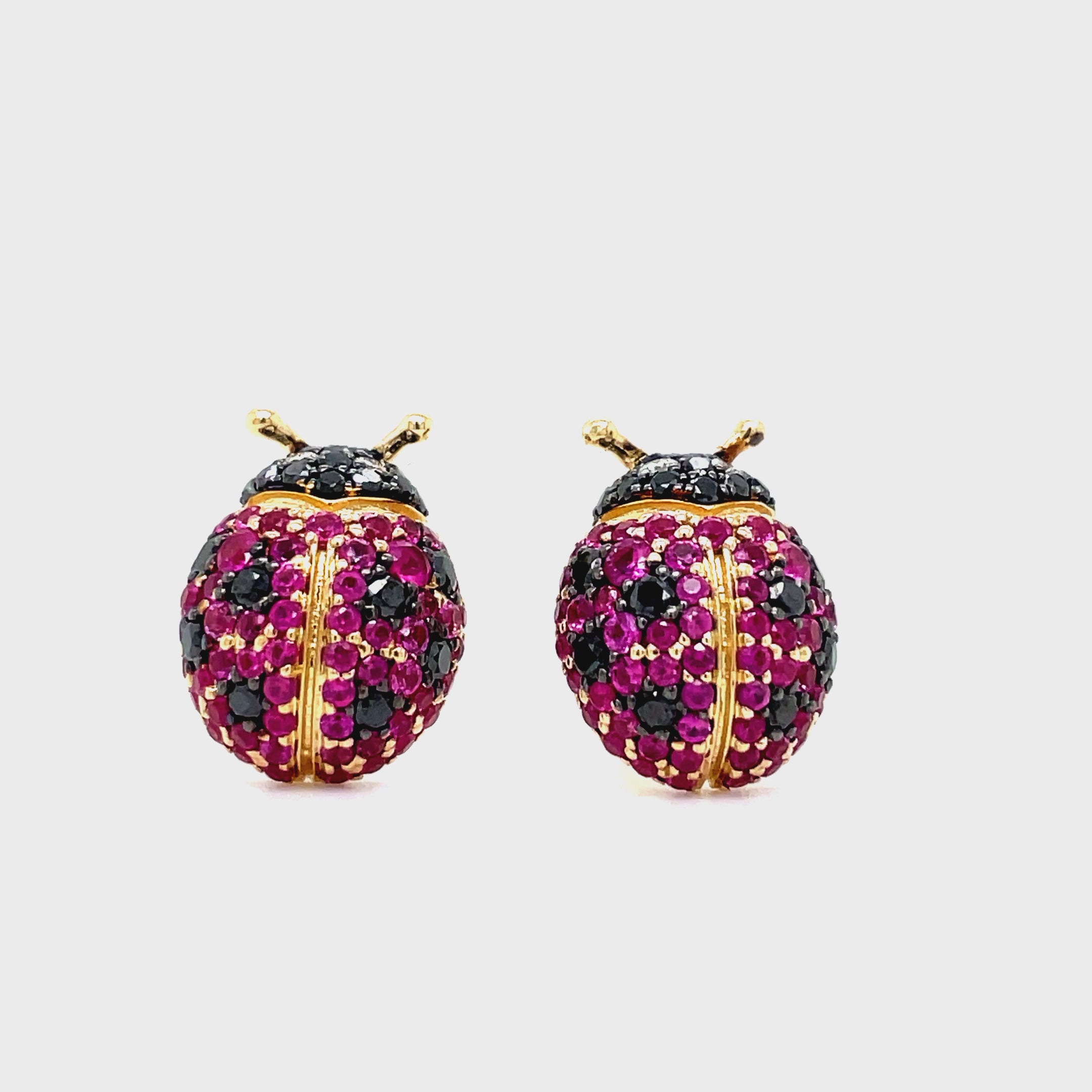 Indulge in luxury with our exquisite 14k Diamond &amp; Sapphire Lady Bug Earrings. Crafted with 14k yellow gold, adorned with sparkling round diamonds totaling 0.40 cts and vibrant pink sapphires totaling 0.93 cts, these earrings are a statement of sophistication. The 13.00 mm size and secure friction backs ensure comfort and security. Elevate your style with these exclusive earrings.