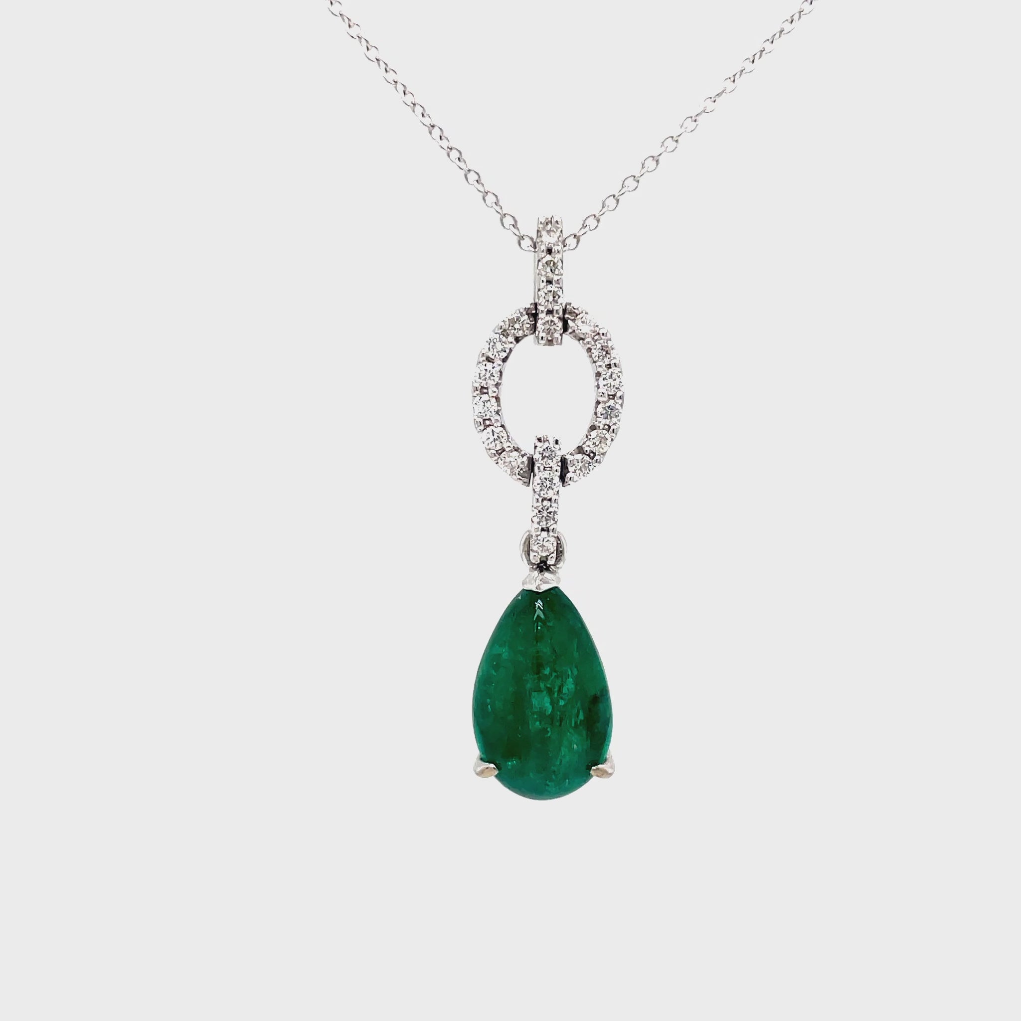 Elevate your style with our Colombian Cabochon Emerald and Diamond Pendant Necklace. The stunning 30.00 mm long, round diamonds totaling 1.40 cts perfectly complement the vibrant Colombian cabochon emerald. Experience the luxury and sophistication of this exclusive piece.

Chain not included $260, 16" long