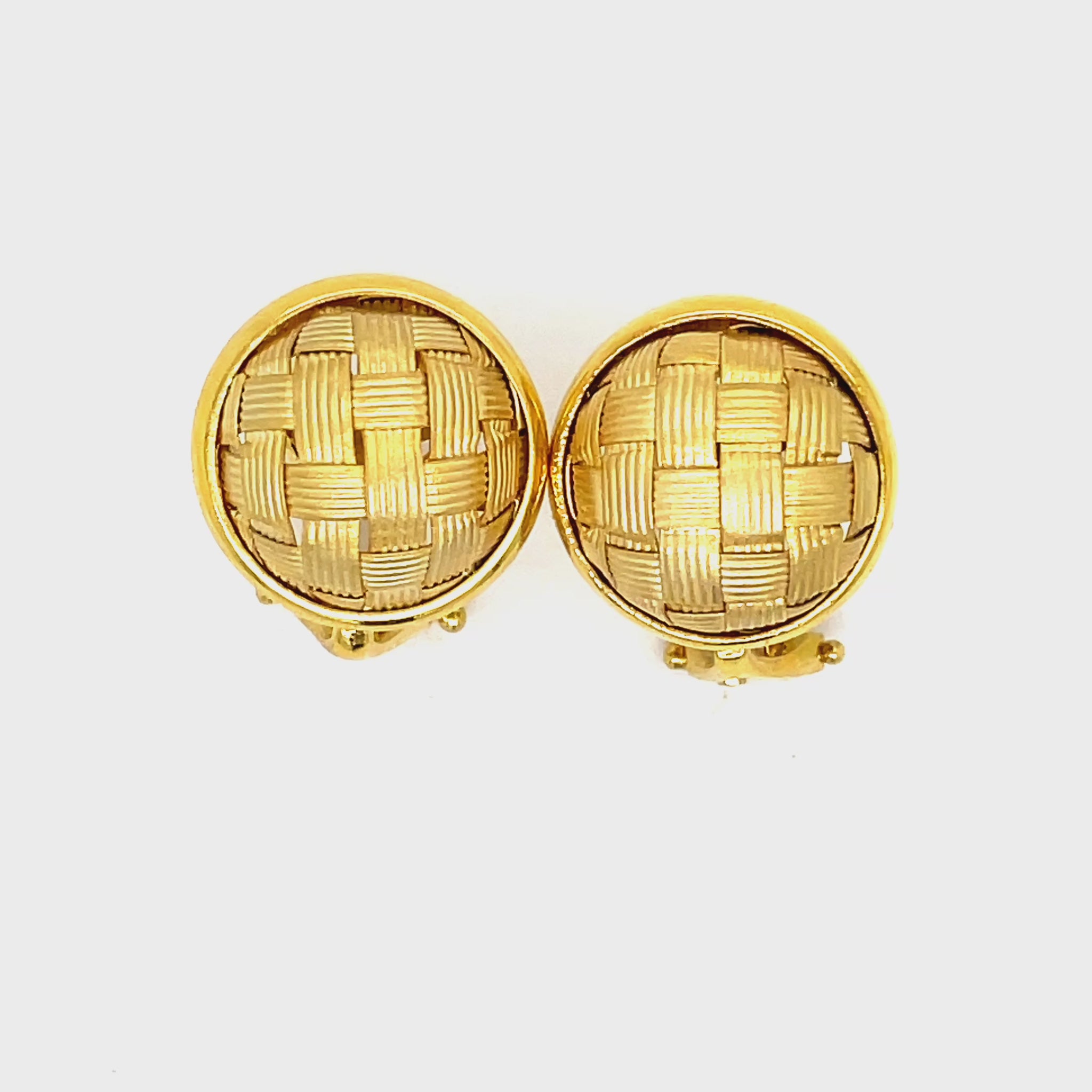 ndulge in luxury with our Italian-made 18k yellow gold clip on earrings. The intricate weave design and matte finish add an artistic touch, while the omega clip ensures a secure fit. Elevate any look with the exclusive gallery finish.