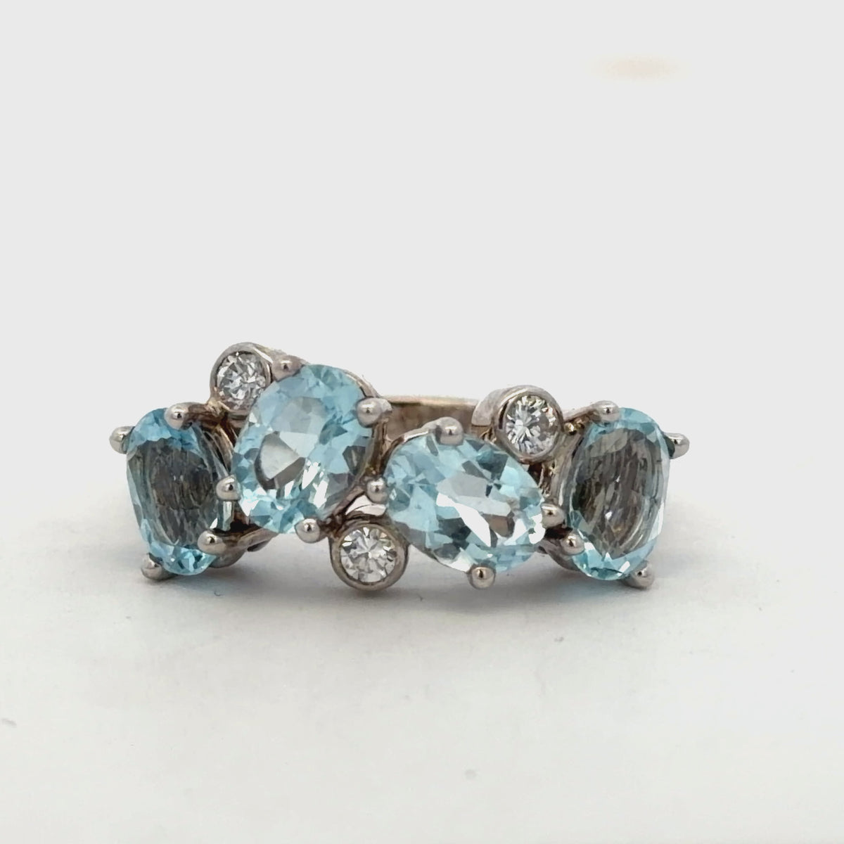 Try on video of 14k White Gold Oval Aquamarine & Diamond Cluster Ring
